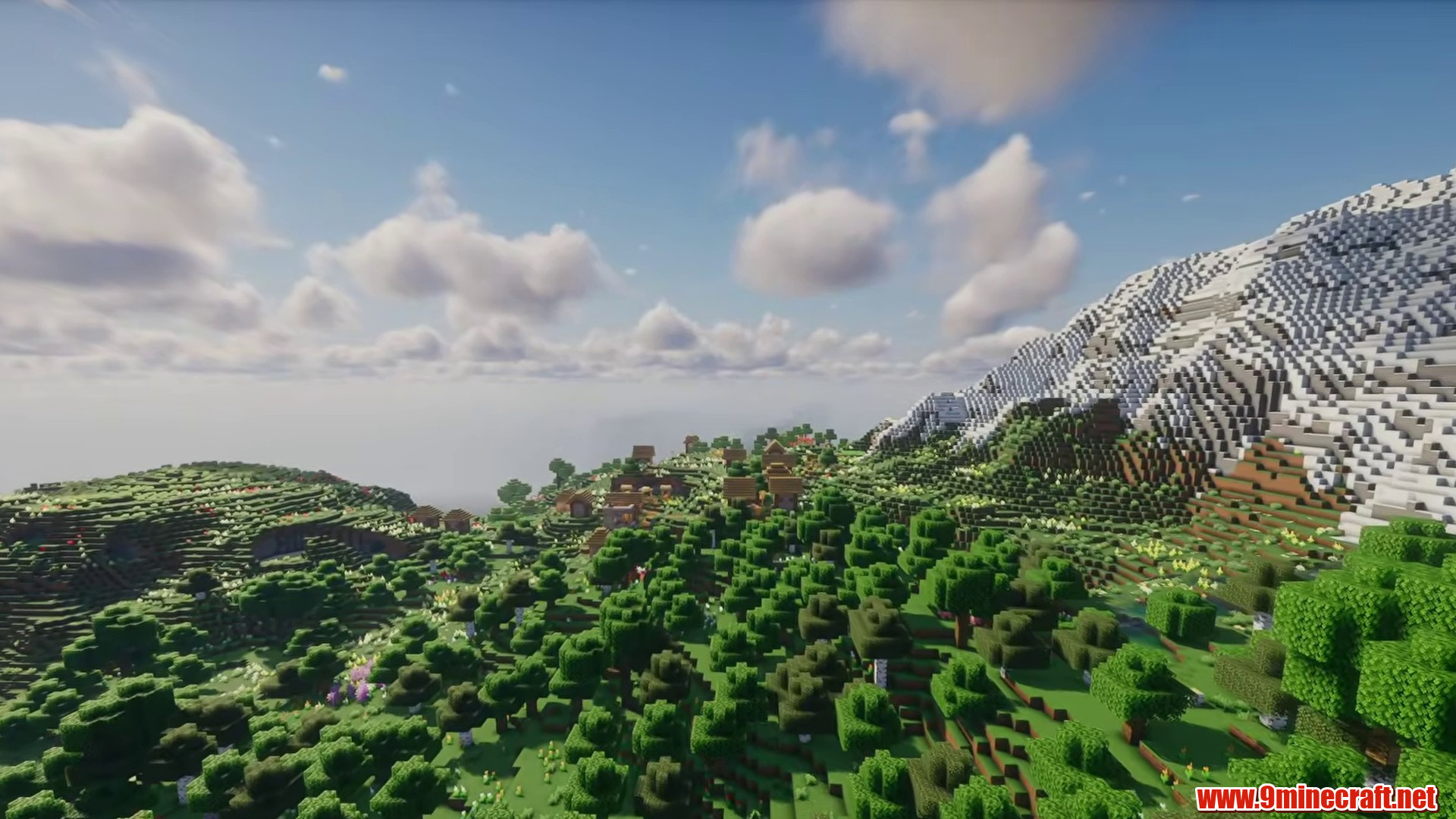 Snow mountain building terrain with open green land