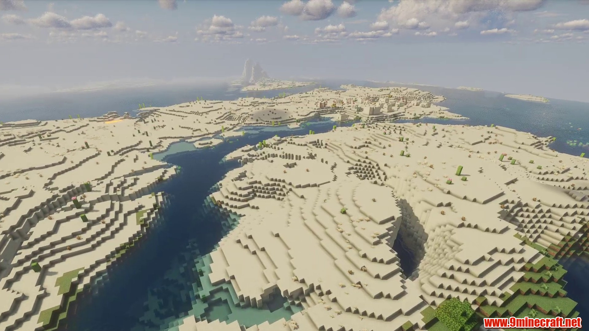 Wide desert shelves split by a river