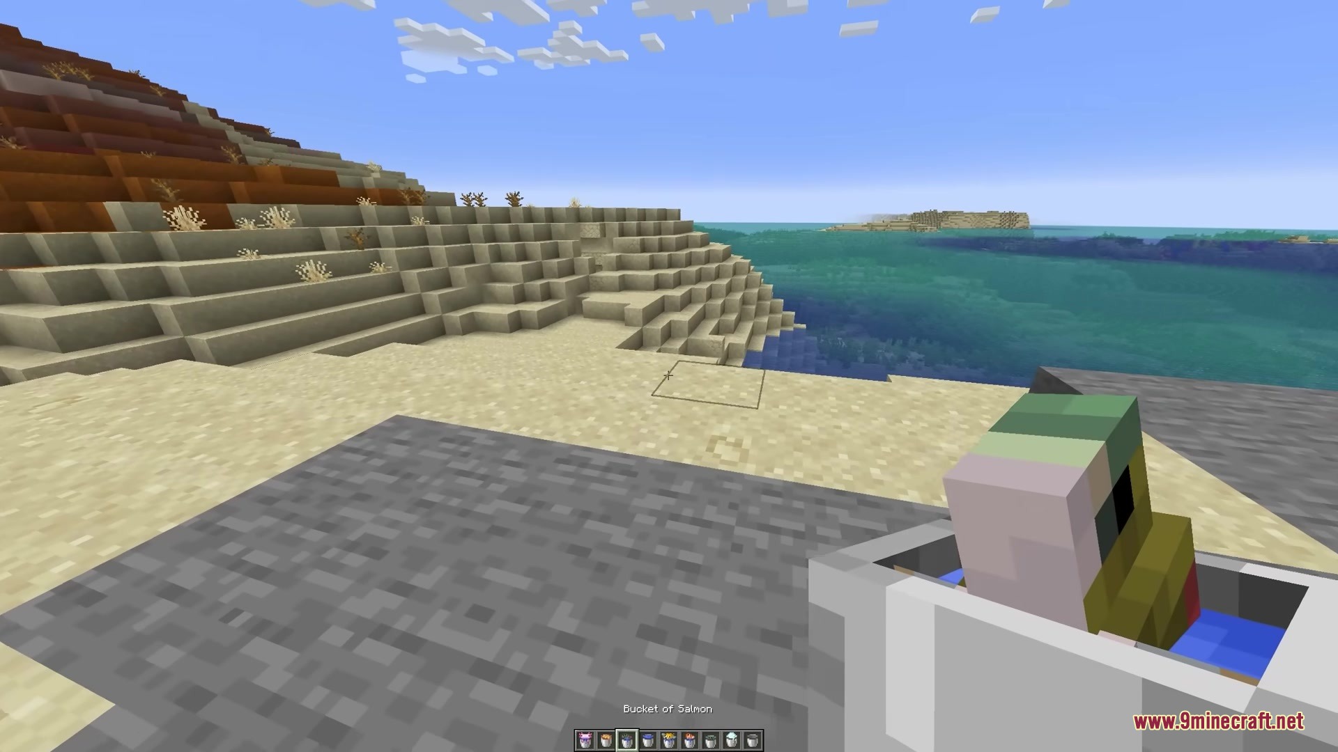 3 D Buckets Resource Pack Screenshot 2 A player holds a 3D bucket of salmon overlooking the vast ocean