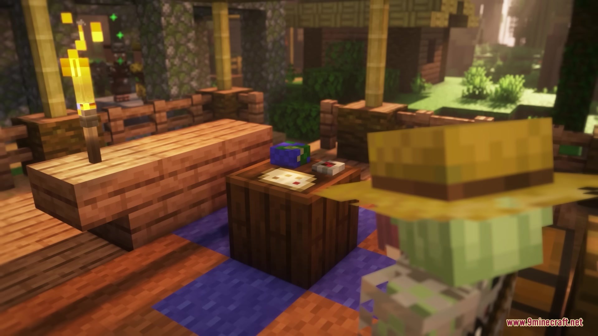 3 D Models Ulti Craft Sandalone Resource Pack Screenshot 4 Player wearing a straw hat looking at a three dimensional globe