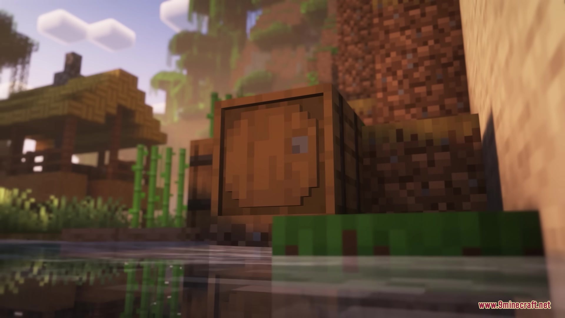 3 D Models Ulti Craft Sandalone Resource Pack Screenshot 6 A wooden barrel with 3D details sitting near a river in a village