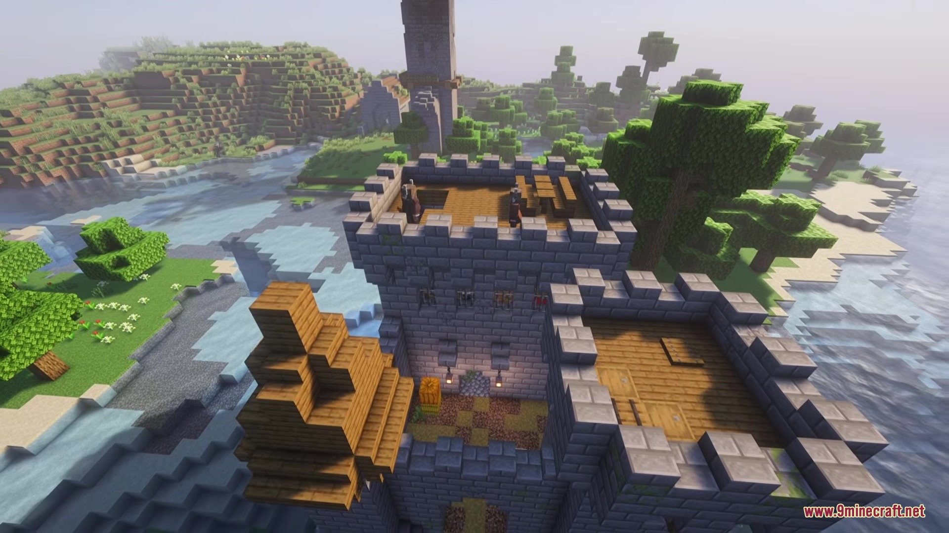 Acolyte Iron's Spells 'n Spellbooks Addon Mod Screenshot 6 Human allies stand on the roof of a large stone castle near water