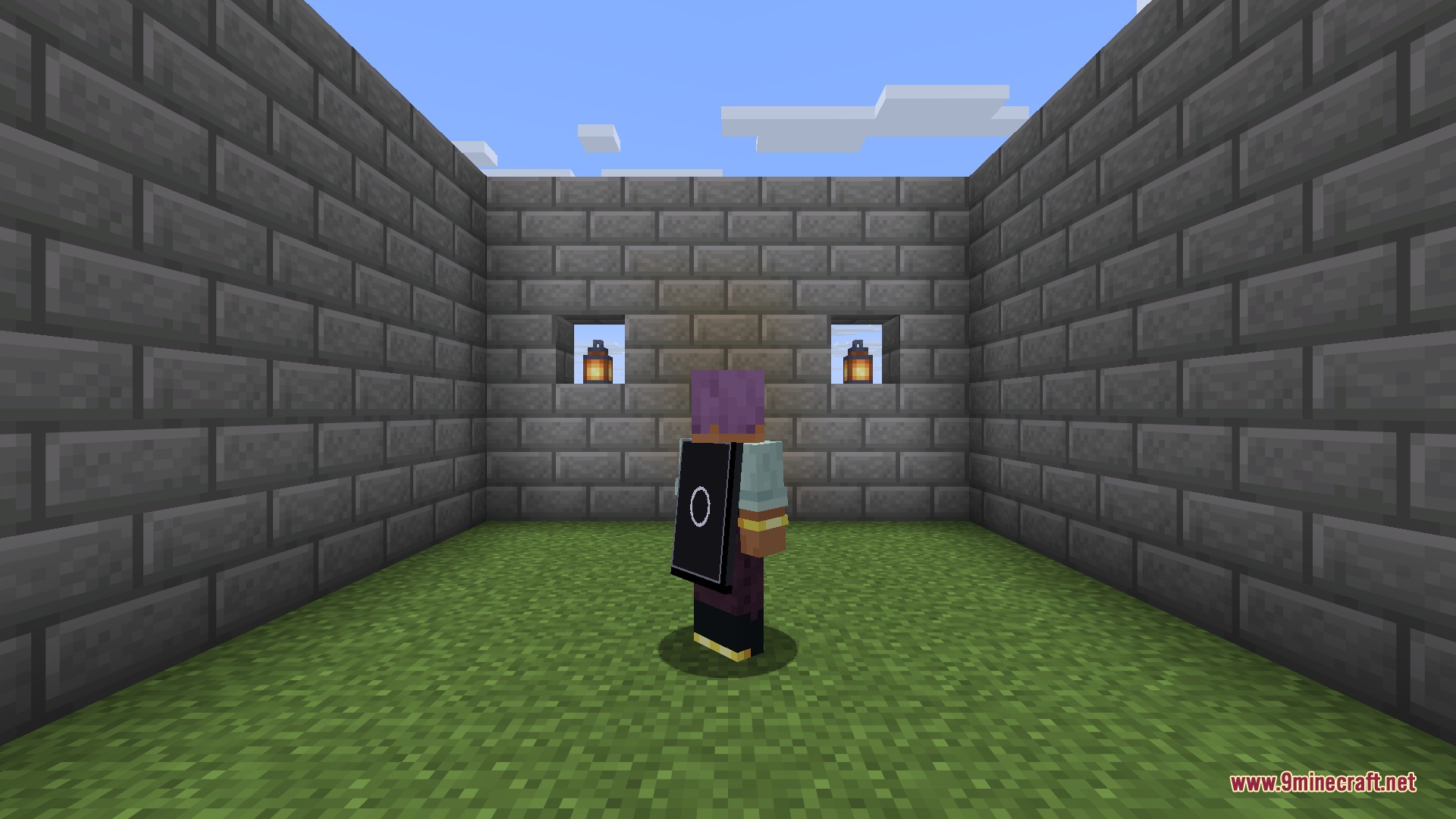 A dark custom cape with a ring emblem, showing how detailed cape designs look on the character.
