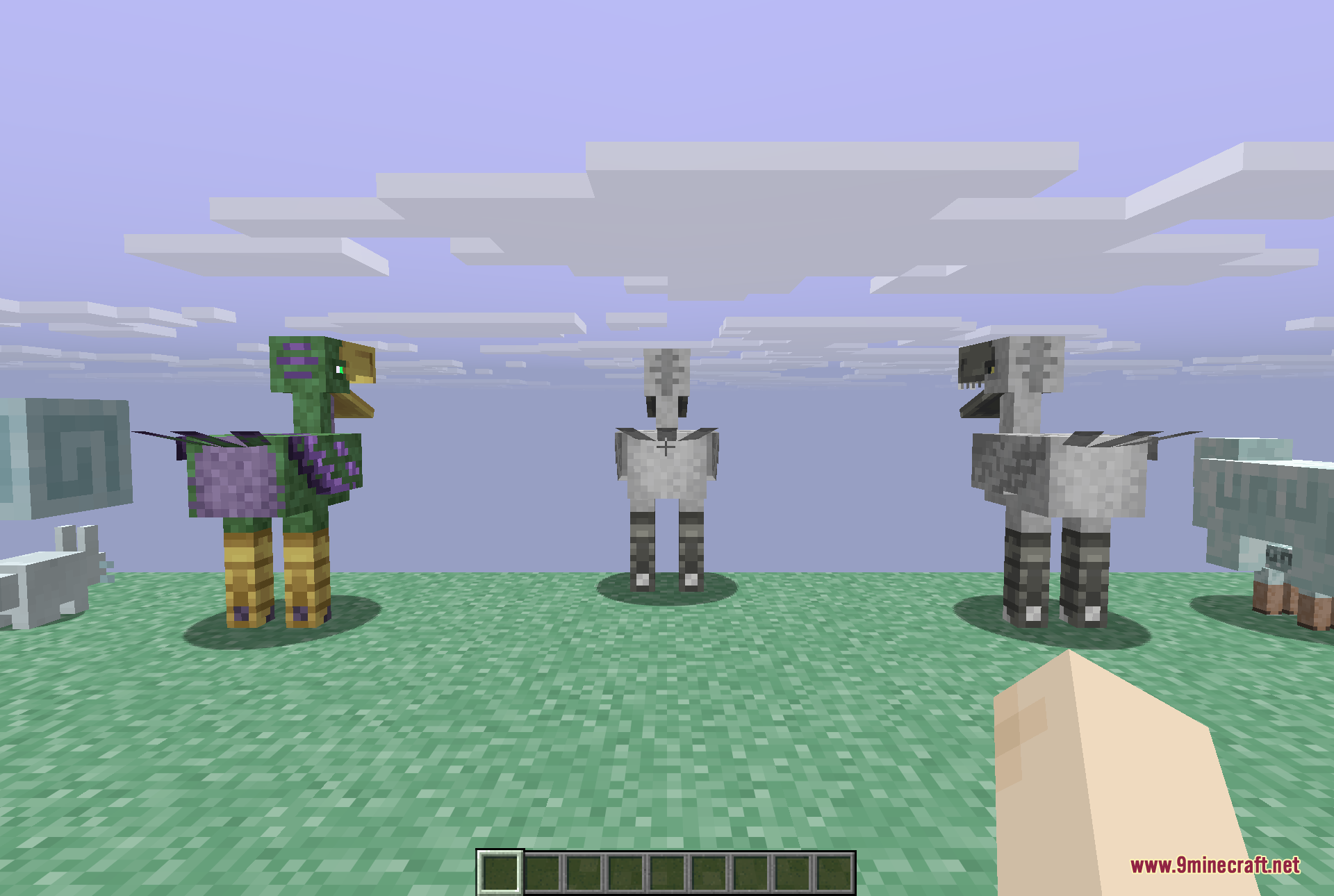 Three tall Moa mounts standing together on grass, one green and purple, one white, and one grey, with a small Aerbunny beside them, showing the birds you hatch and ride
