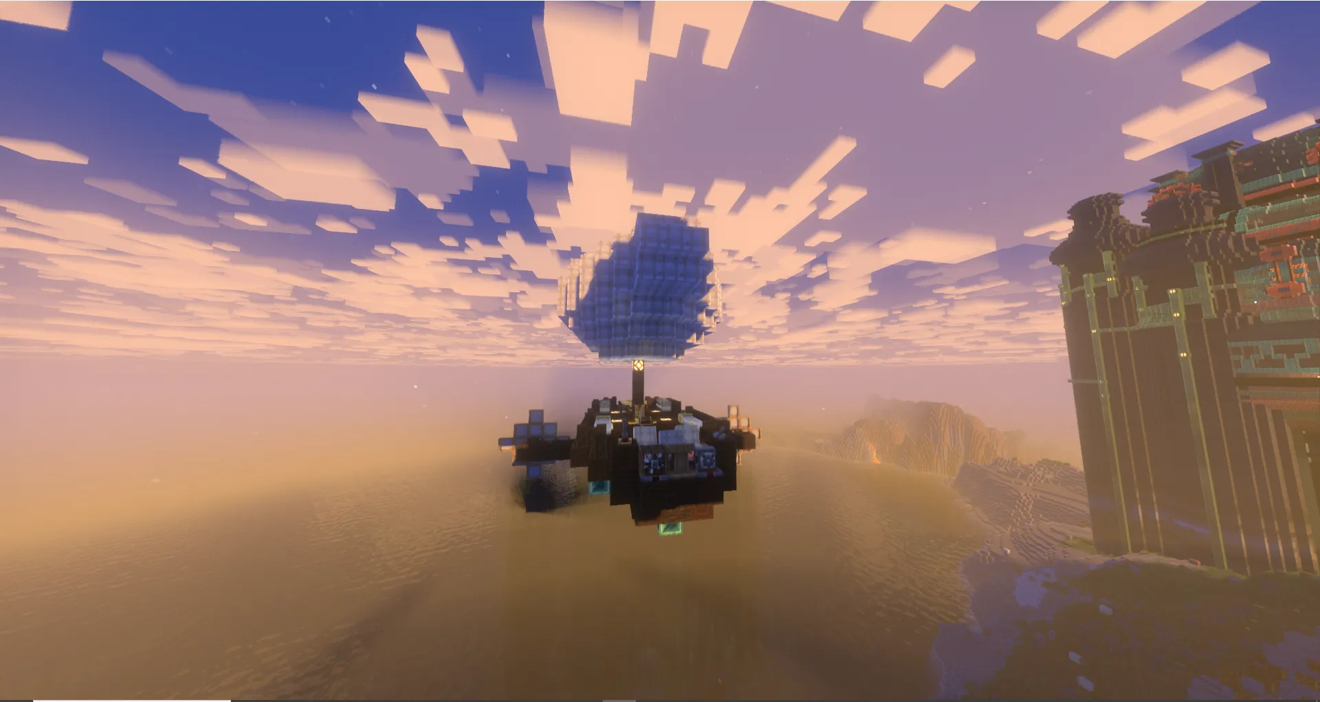 A dark airship with a blue balloon flying near a large tower