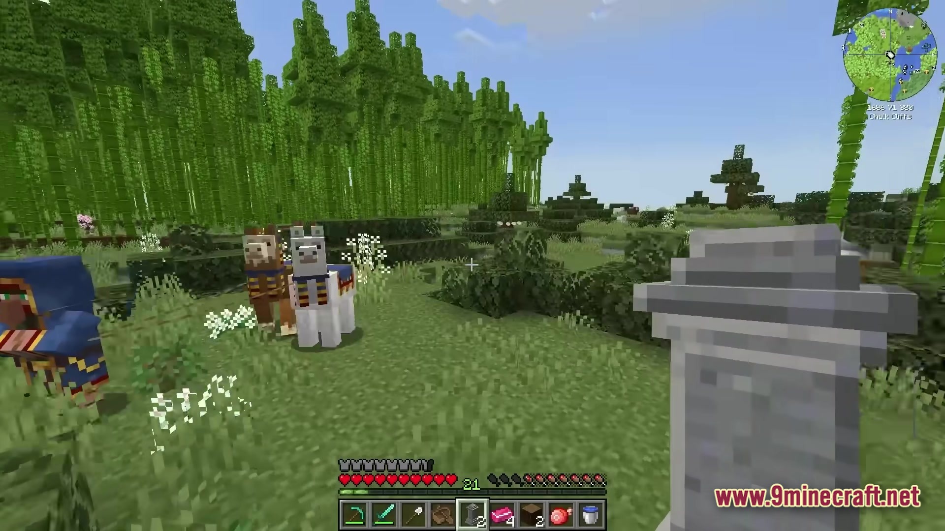 All The Mods 10 ATM10 Modpack Screenshot 6 A wandering trader and two llamas stand in a bamboo forest biome near a stone gravestone