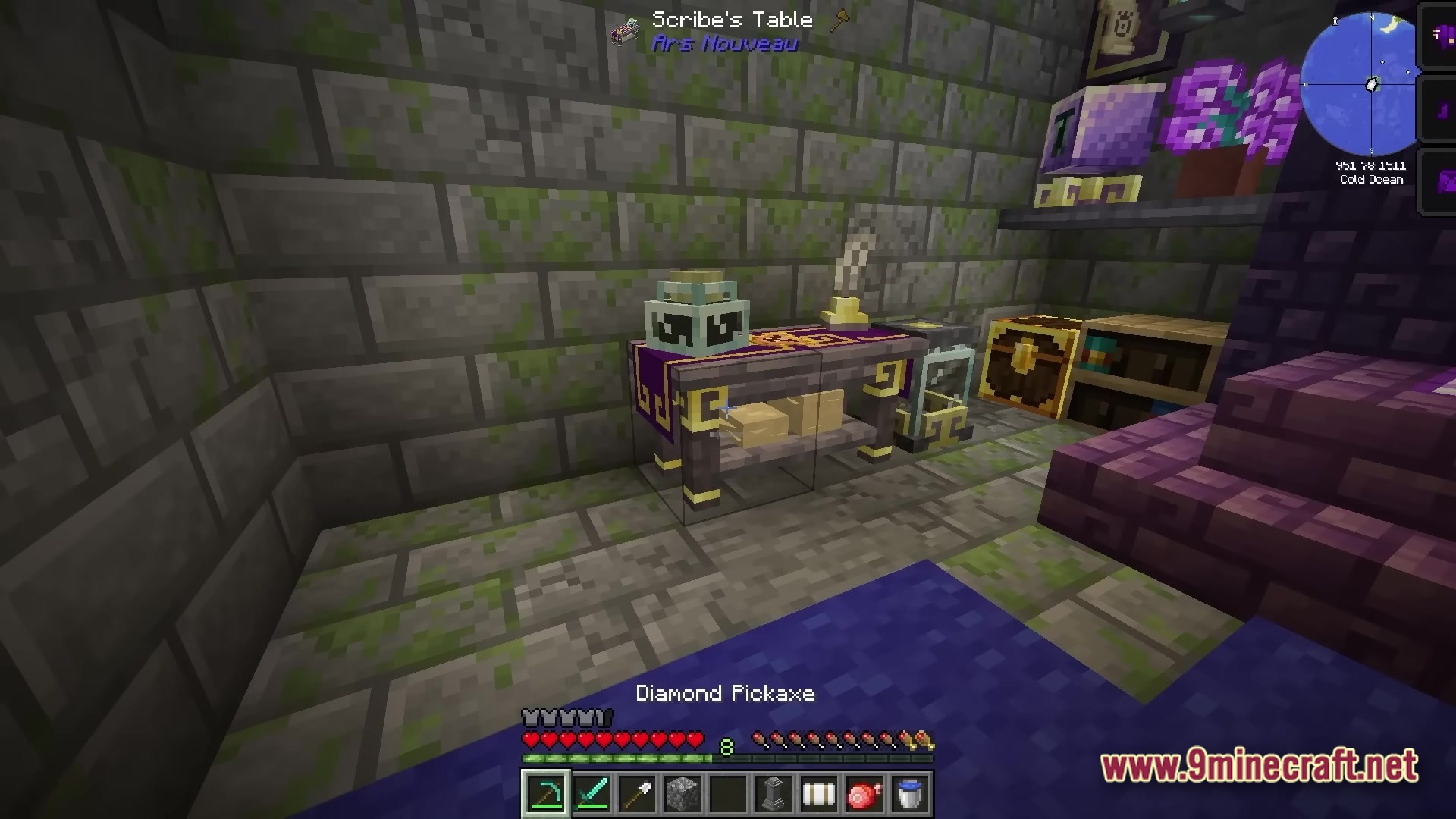 A Scribe's Table from the Ars Nouveau mod placed inside a mossy stone brick room
