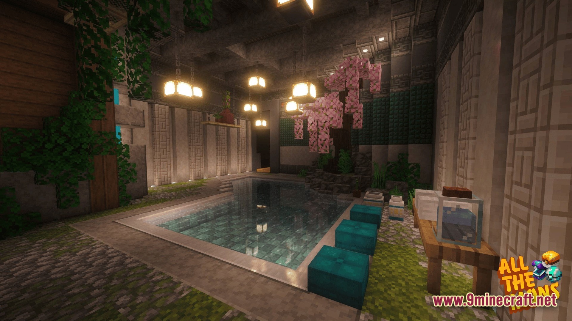 An indoor pool area featuring hanging lanterns, a cherry blossom tree, and decorative stone walls