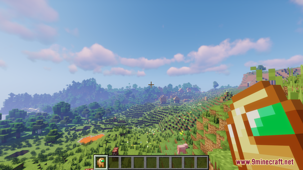 A player holds a custom Among Us crewmate totem while overlooking a village