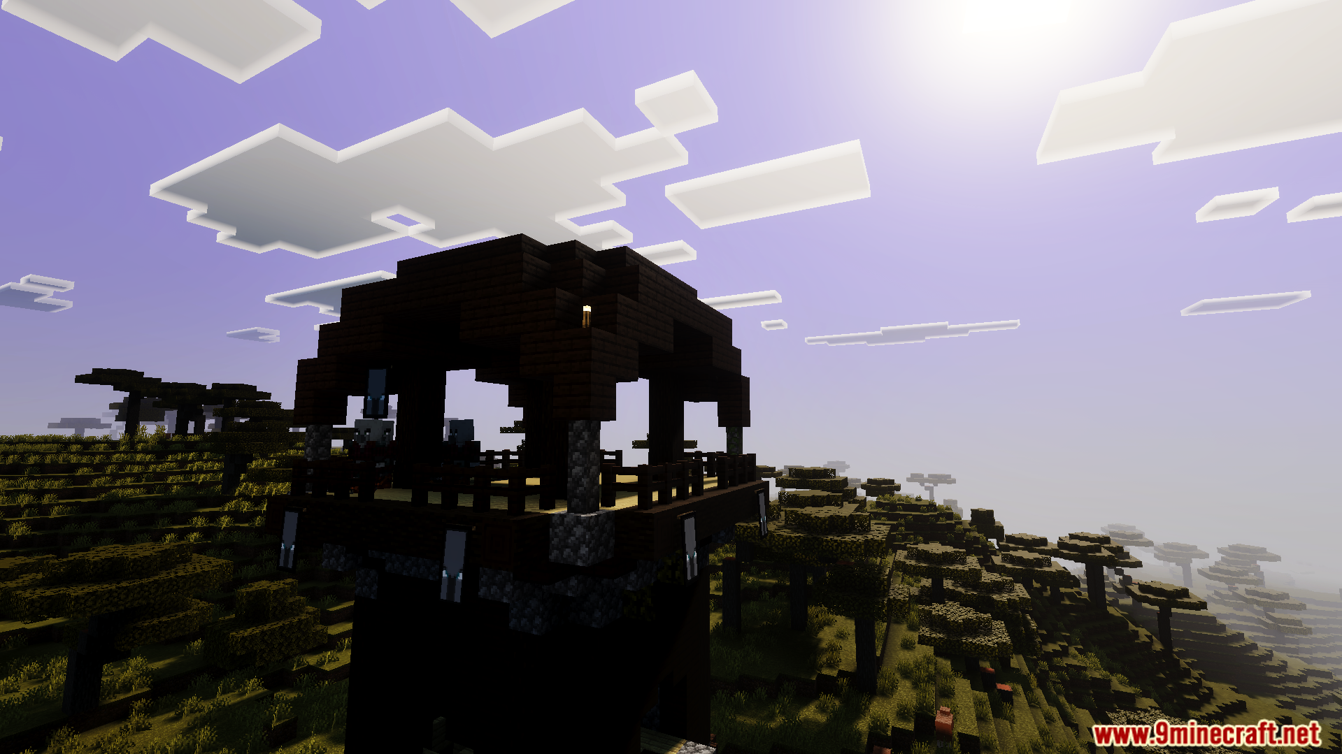 A pillager outpost stands in a savanna biome under a bright purple sky