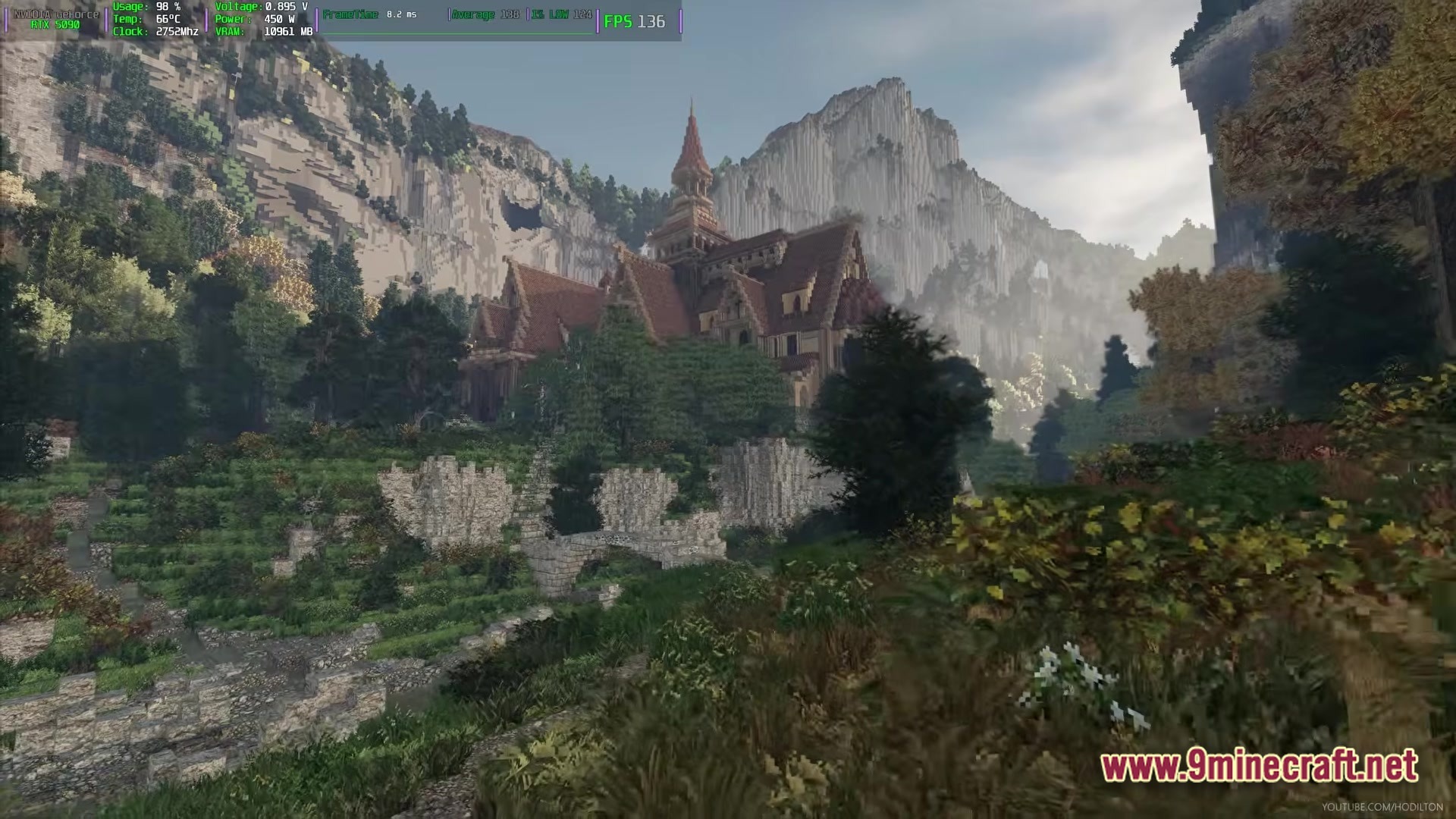 Arda Craft Modpack Screenshot 3 A large wooden manor with a spire sits nestled among trees and steep, rocky mountains