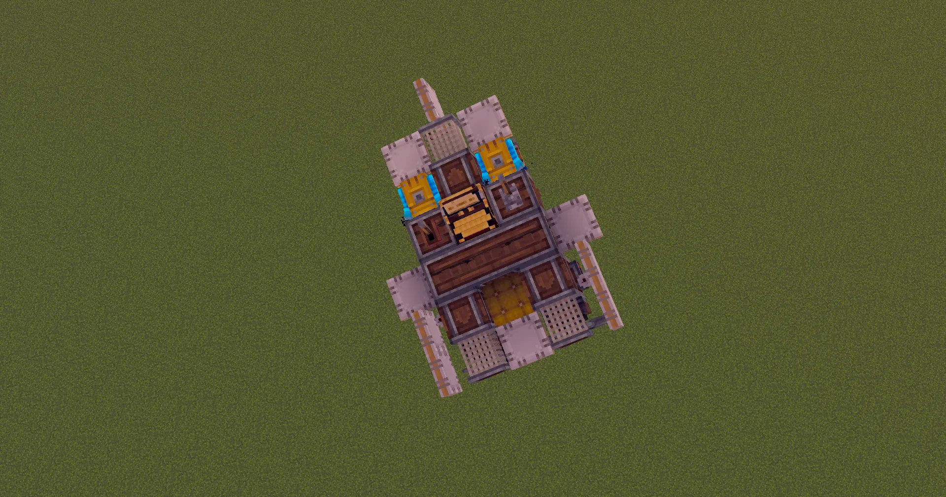Top down view of a compact wooden aircraft over a green field