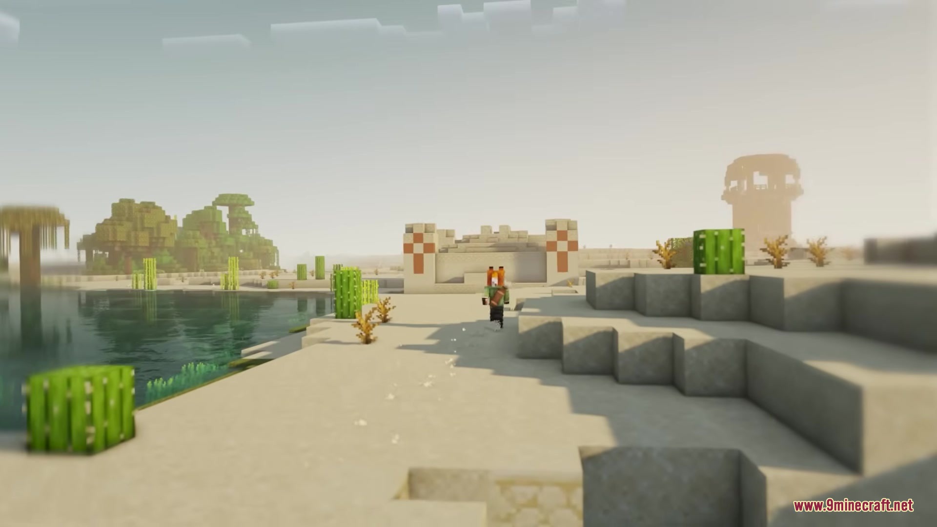 As You Wish Mod Screenshot 2 A player character runs across a sandy desert toward a Genie Tombstone structure