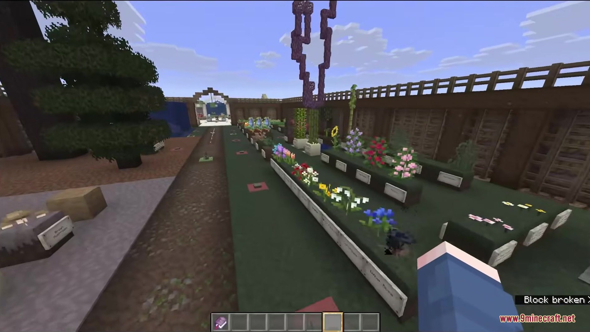 Minecraft garden showcasing various flower and plant textures in medieval style
