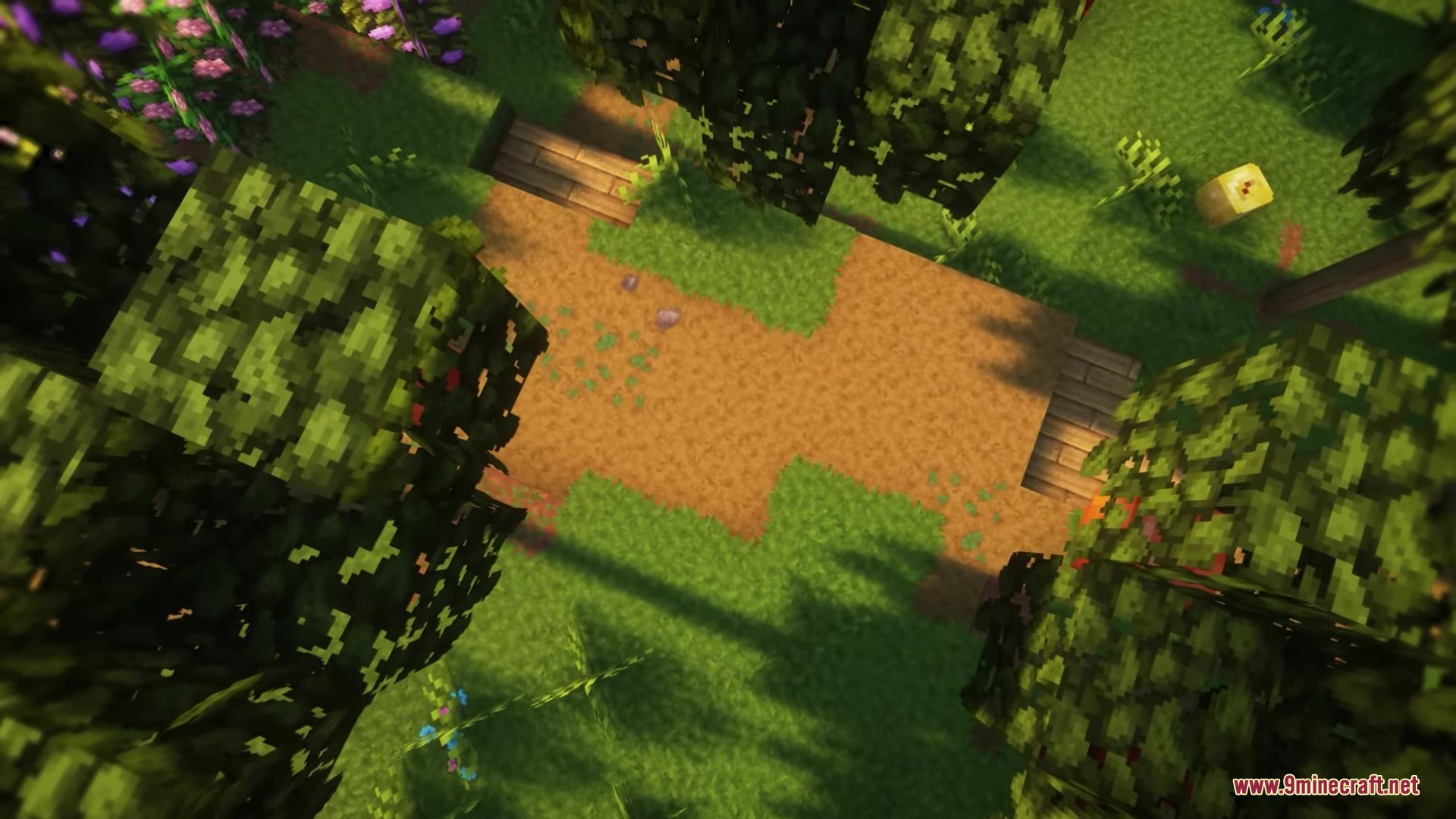 Avalon 32x Resource Pack Screenshot 4 A dirt path winding through a lush green forest with vibrant flowers