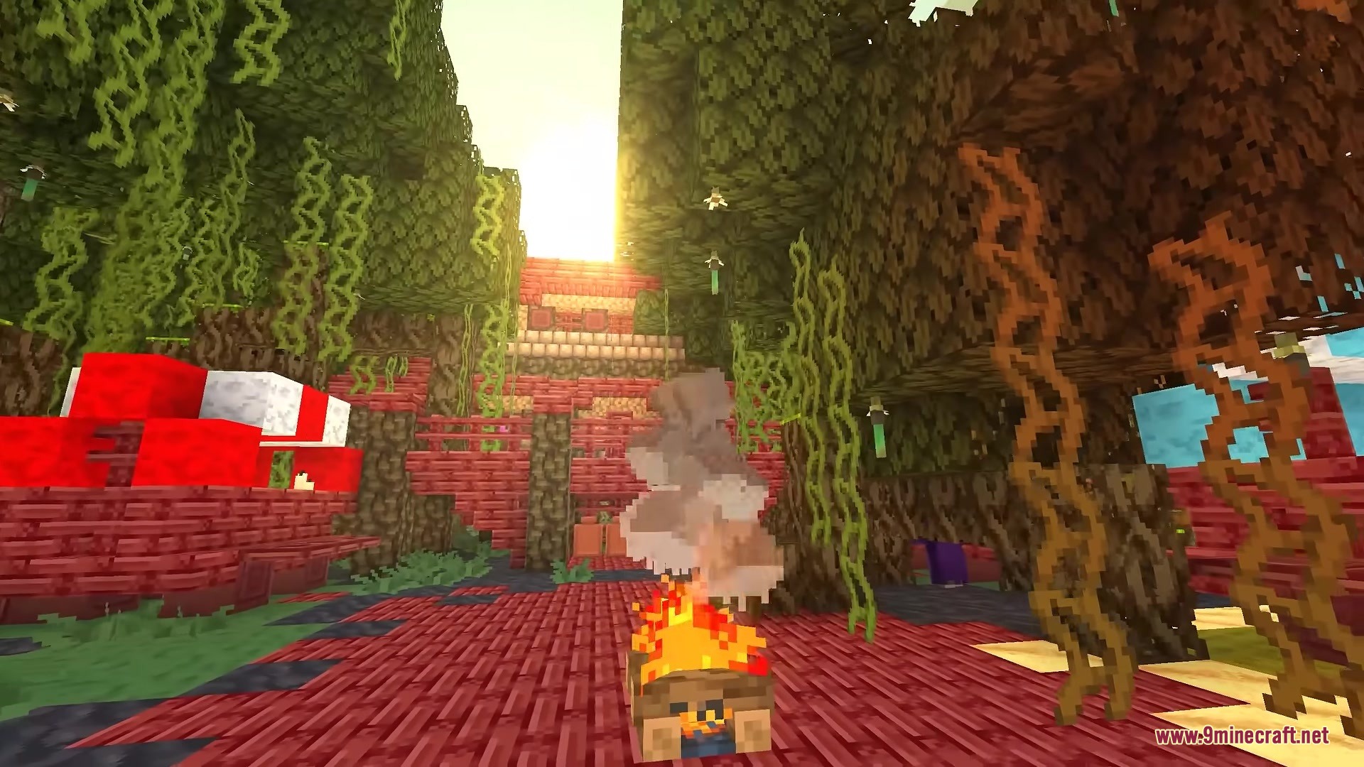 BB's Bosses of Mass Destruction Tweaks Resource Pack Screenshot 1 A campfire burns in a forest with red wood and hanging green vines