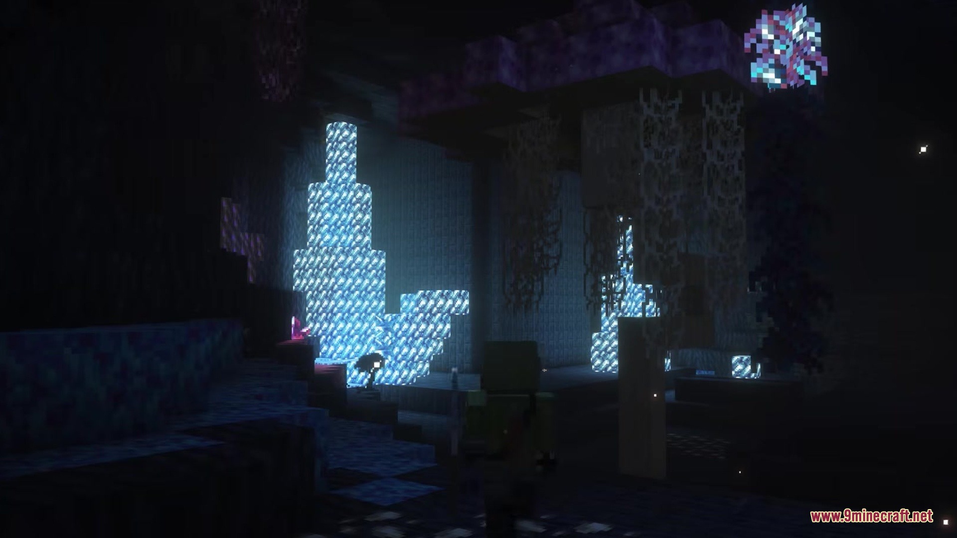 Be Bee Queen Dragon Survival Addon Mod Screenshot 14 Bright blue crystal formations light up a dark cave with purple blocks