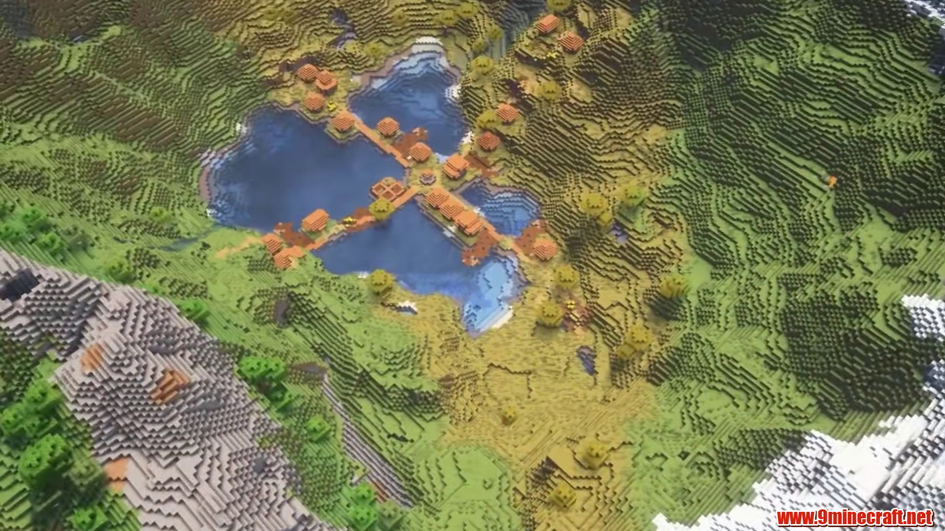 Mountain-ringed village landscape with lakes