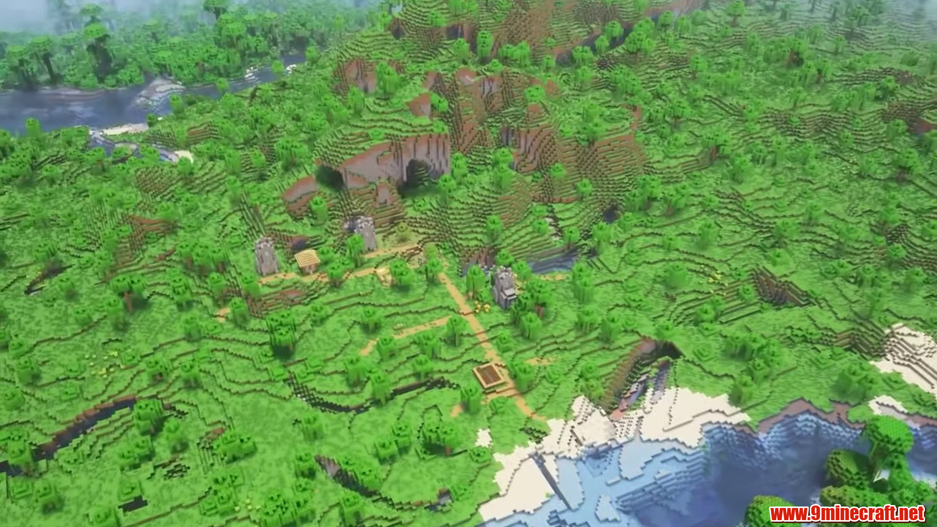 Village and river terrain beside dense jungle