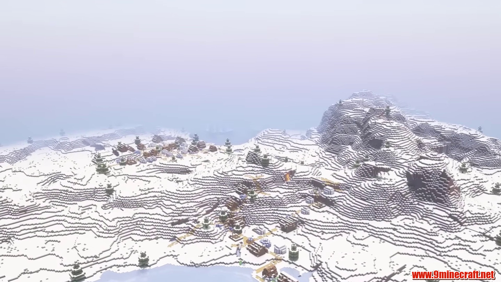 Snowy basin village surrounded by mountains