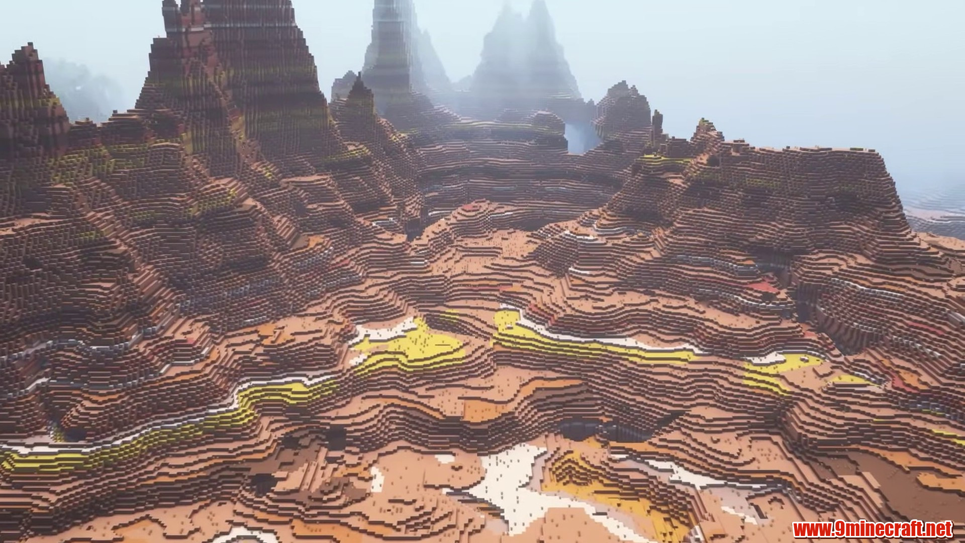 Badlands spires surrounding a deep lake