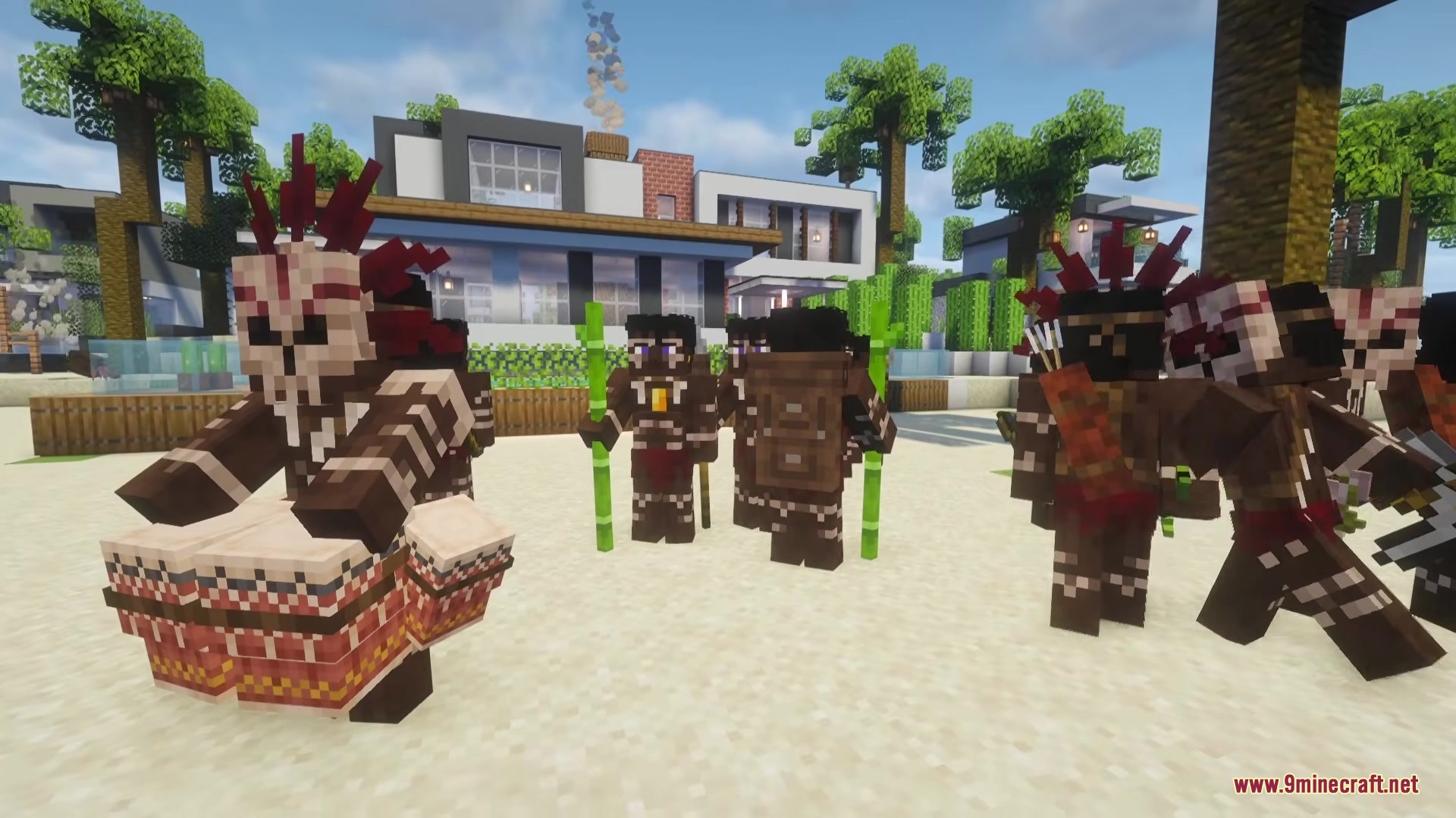 Tribal cannibals wearing masks and playing drums on a sunny tropical beach