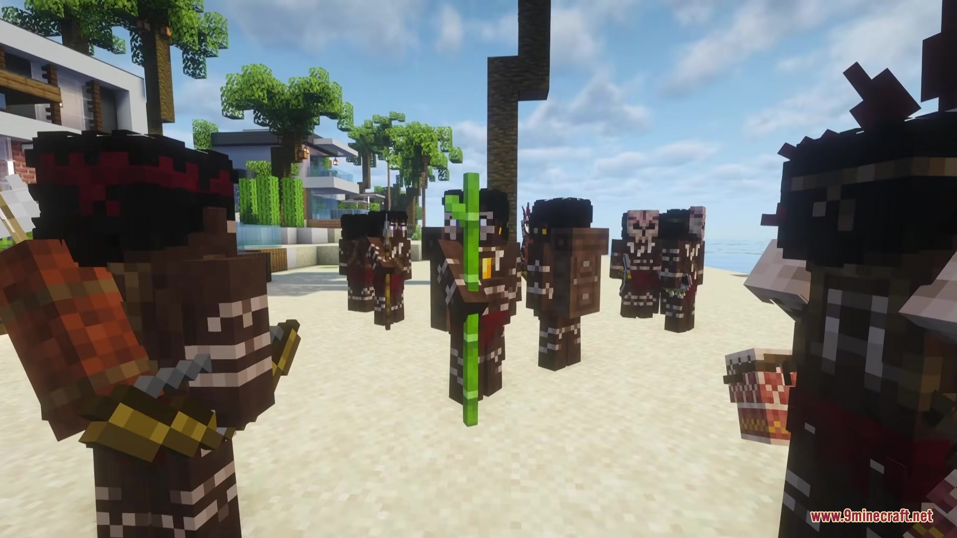 Aggressive tribal cannibals holding bamboo sticks on a beach near modern houses