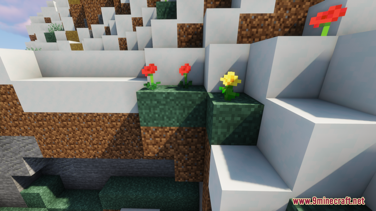 Red and yellow flowers on smooth connected grass blocks in a snowy biome