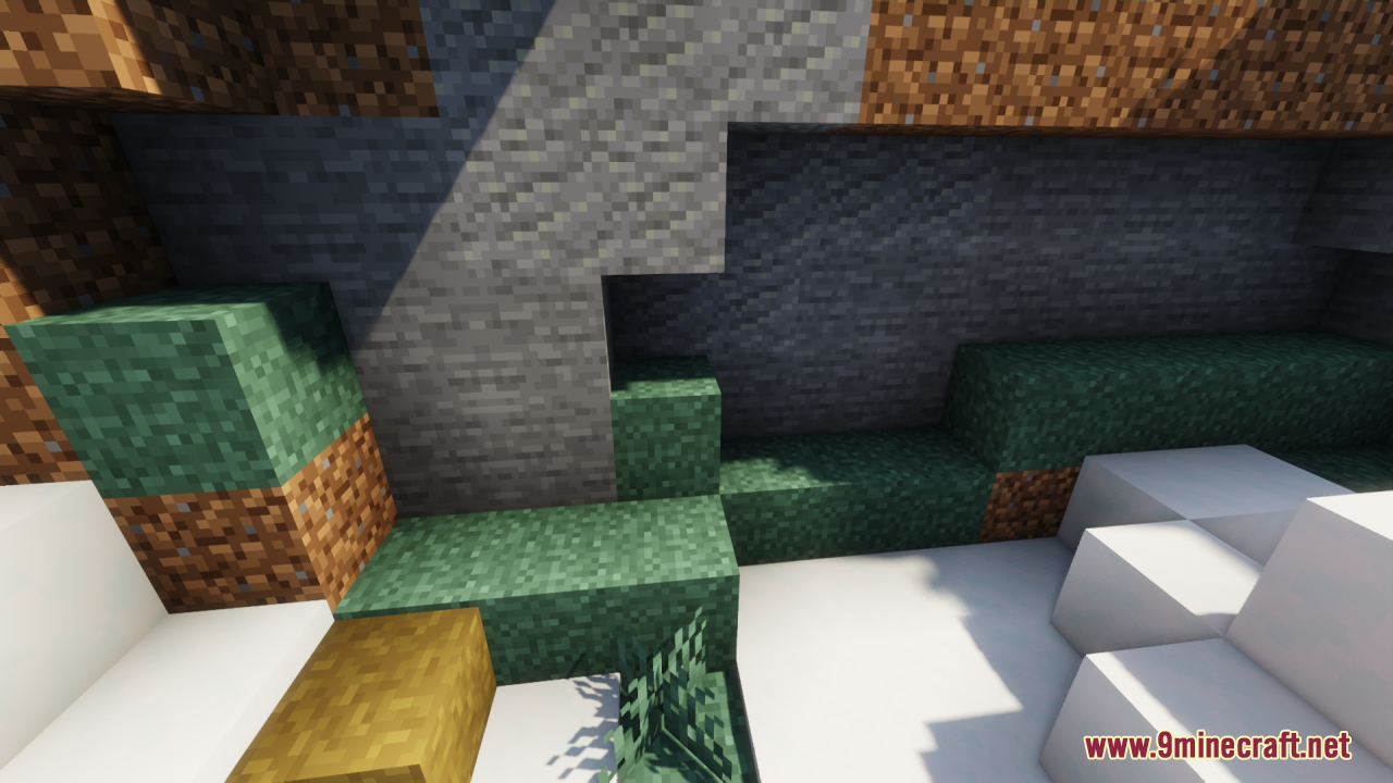 Connected grass textures on a hillside with stone and dirt blocks