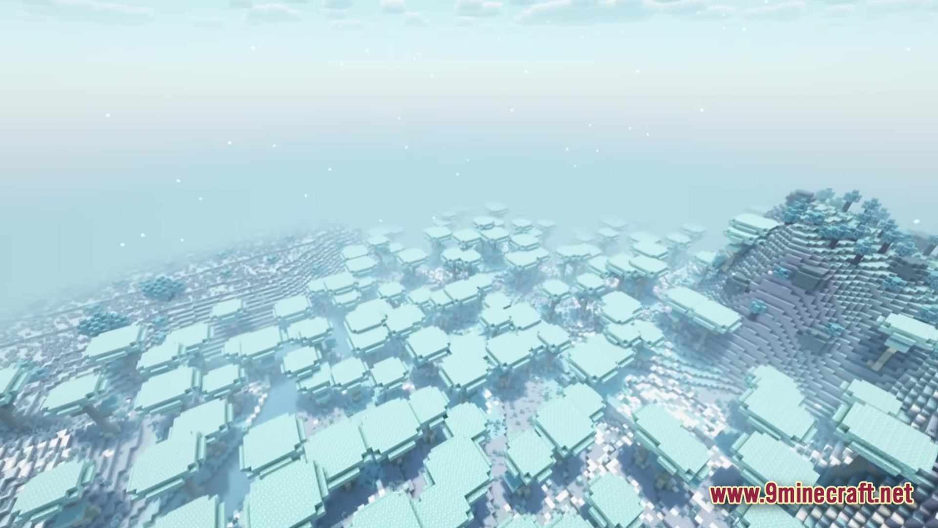 Better MC BMC5 Modpack Screenshot 4 An aerial view of a snowy forest biome featuring flat-topped trees and a misty atmosphere