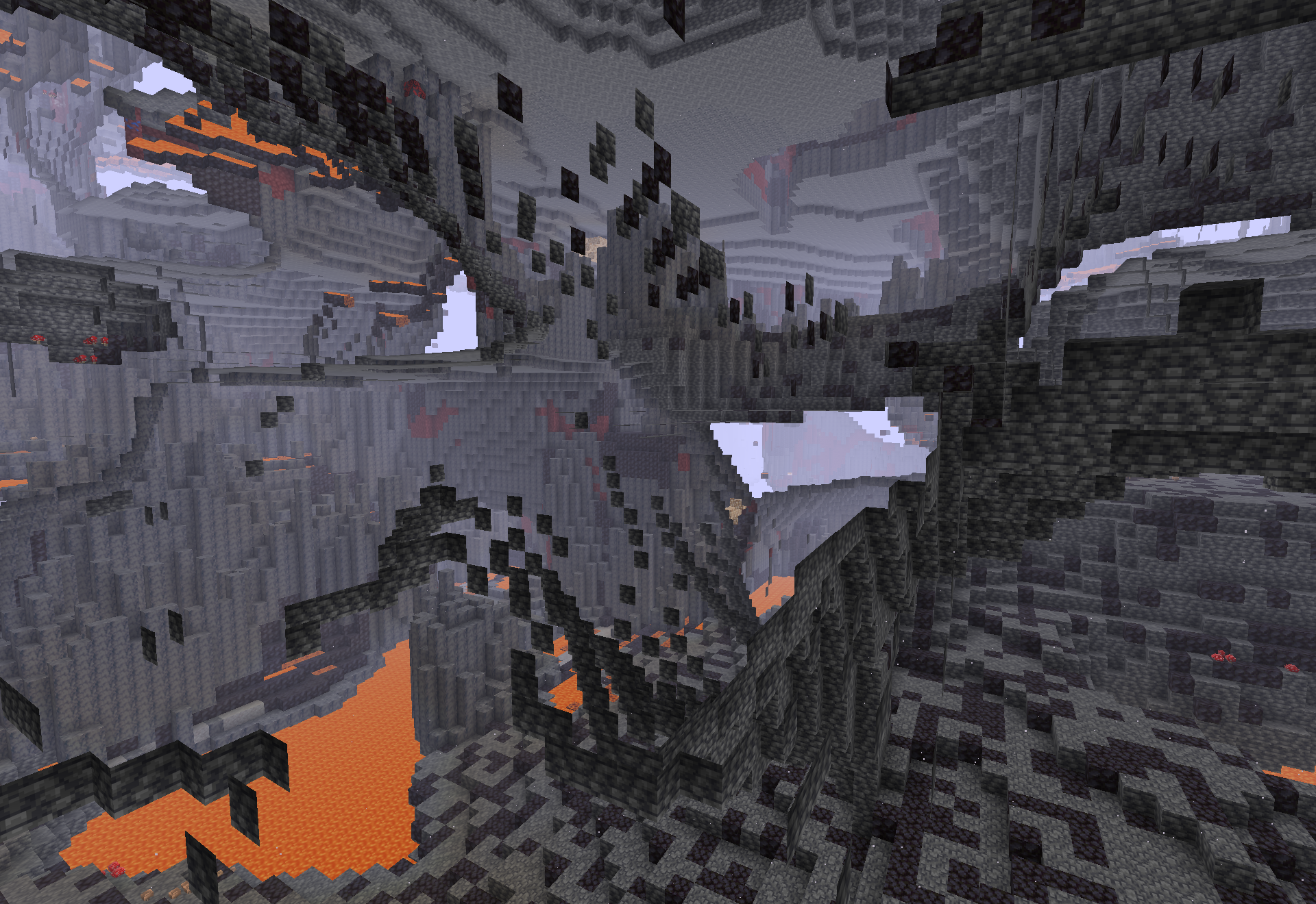 The flooded deltas biome - gray basalt columns and ledges rising over open lava pools.
