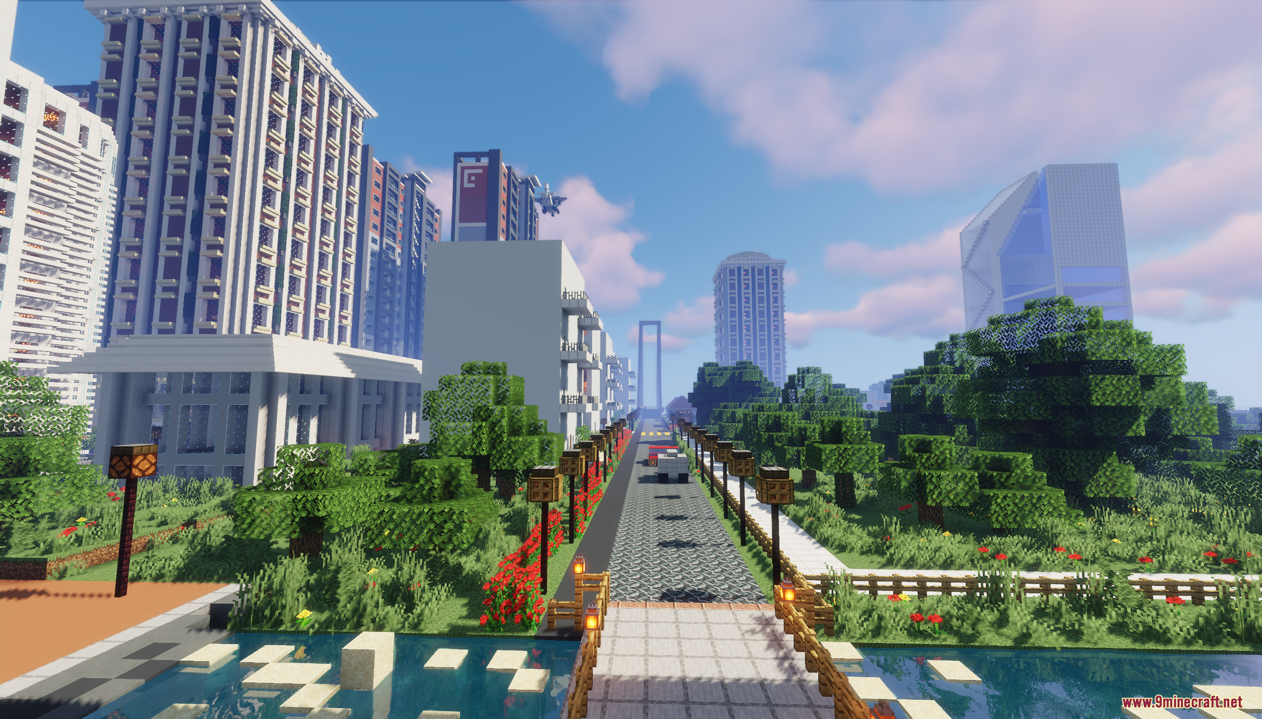 A scenic street view with lush greenery and tall buildings in Minecraft
