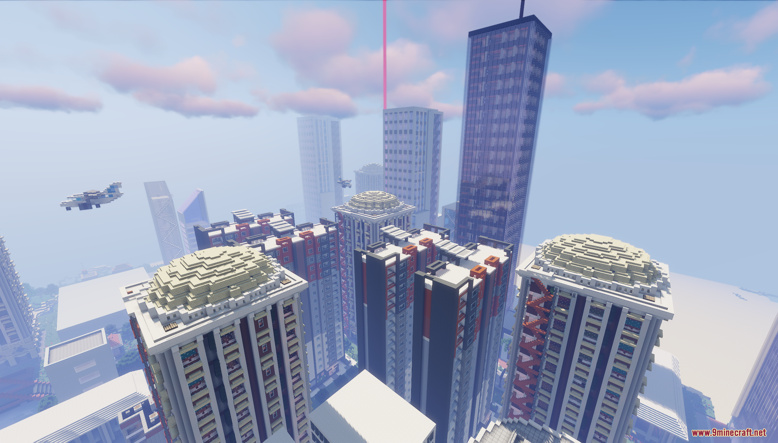 An airplane flies past tall buildings with dome roofs in a modern city