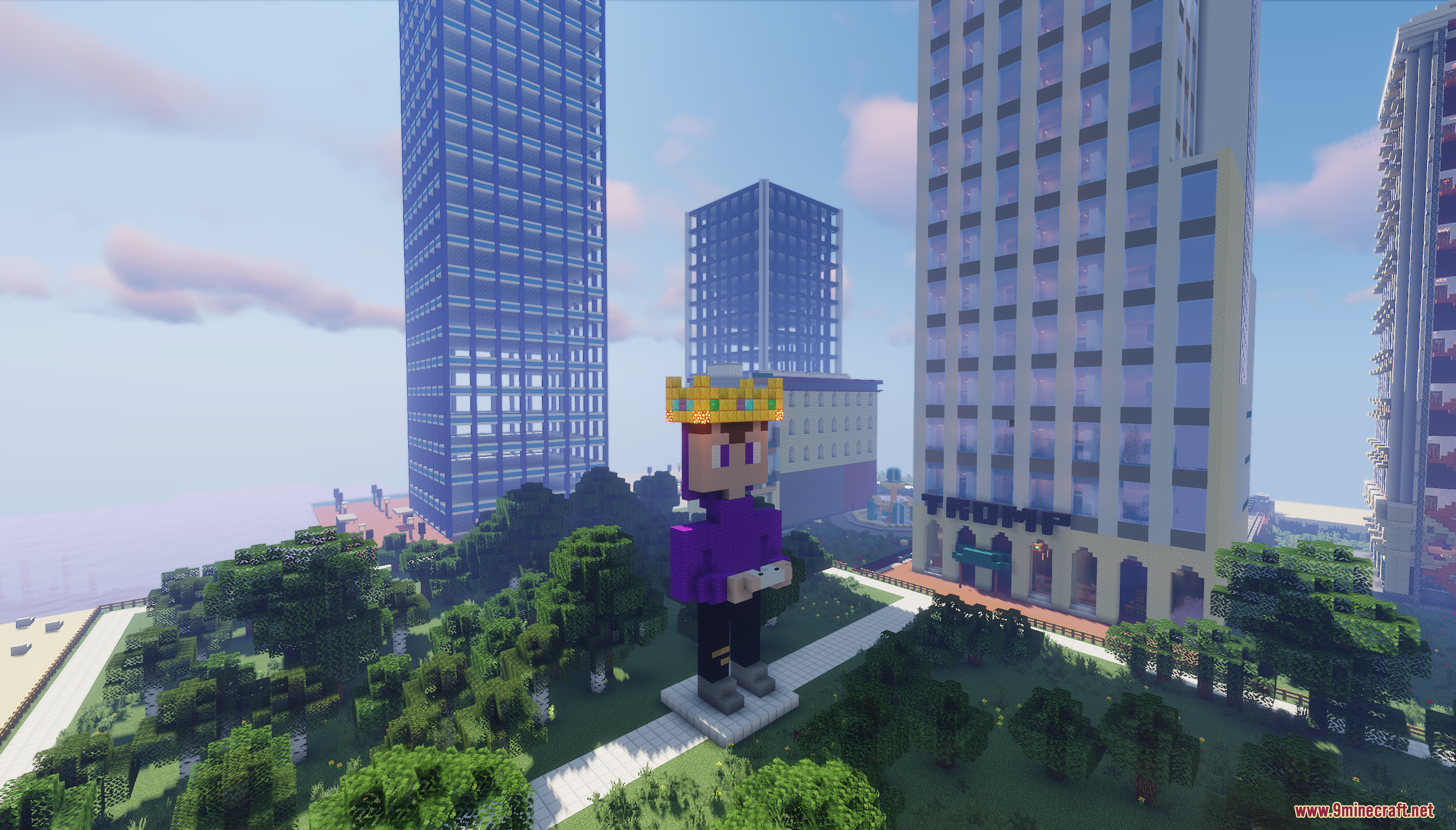 Giant player statue with a crown standing in a modern city park