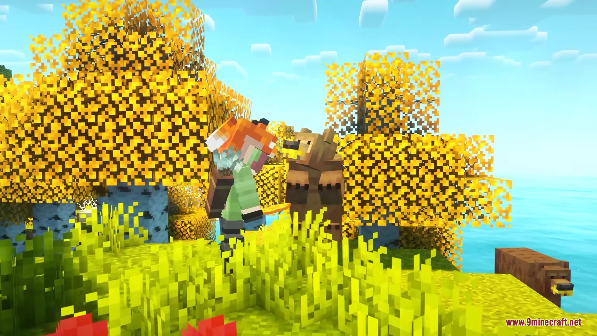 Player wearing fox headpiece stands near a brown bear in yellow woods