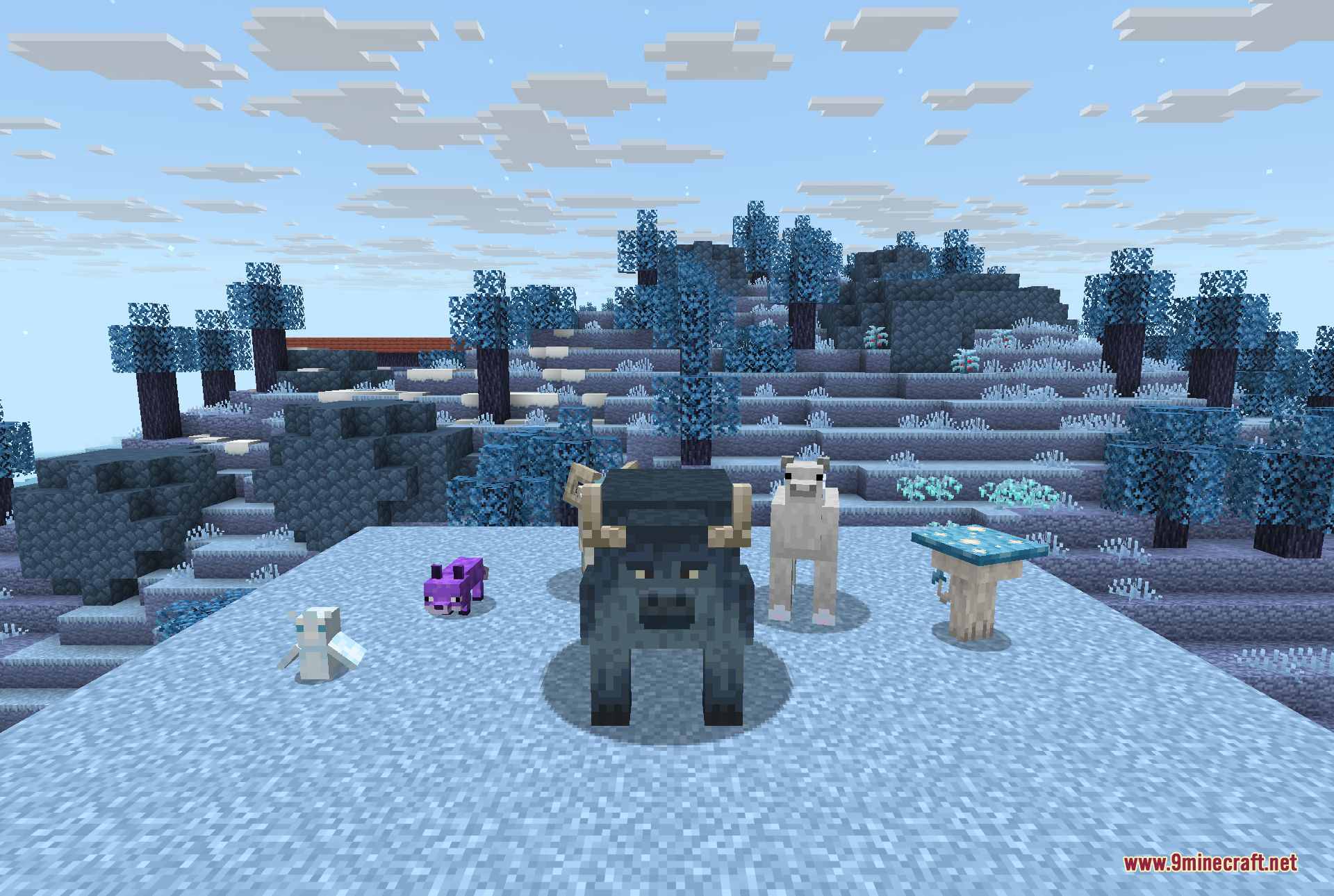 A group of the Everbright's new creatures gathered on the snow, including a large horned beast, a shaggy white animal and smaller passive mobs.