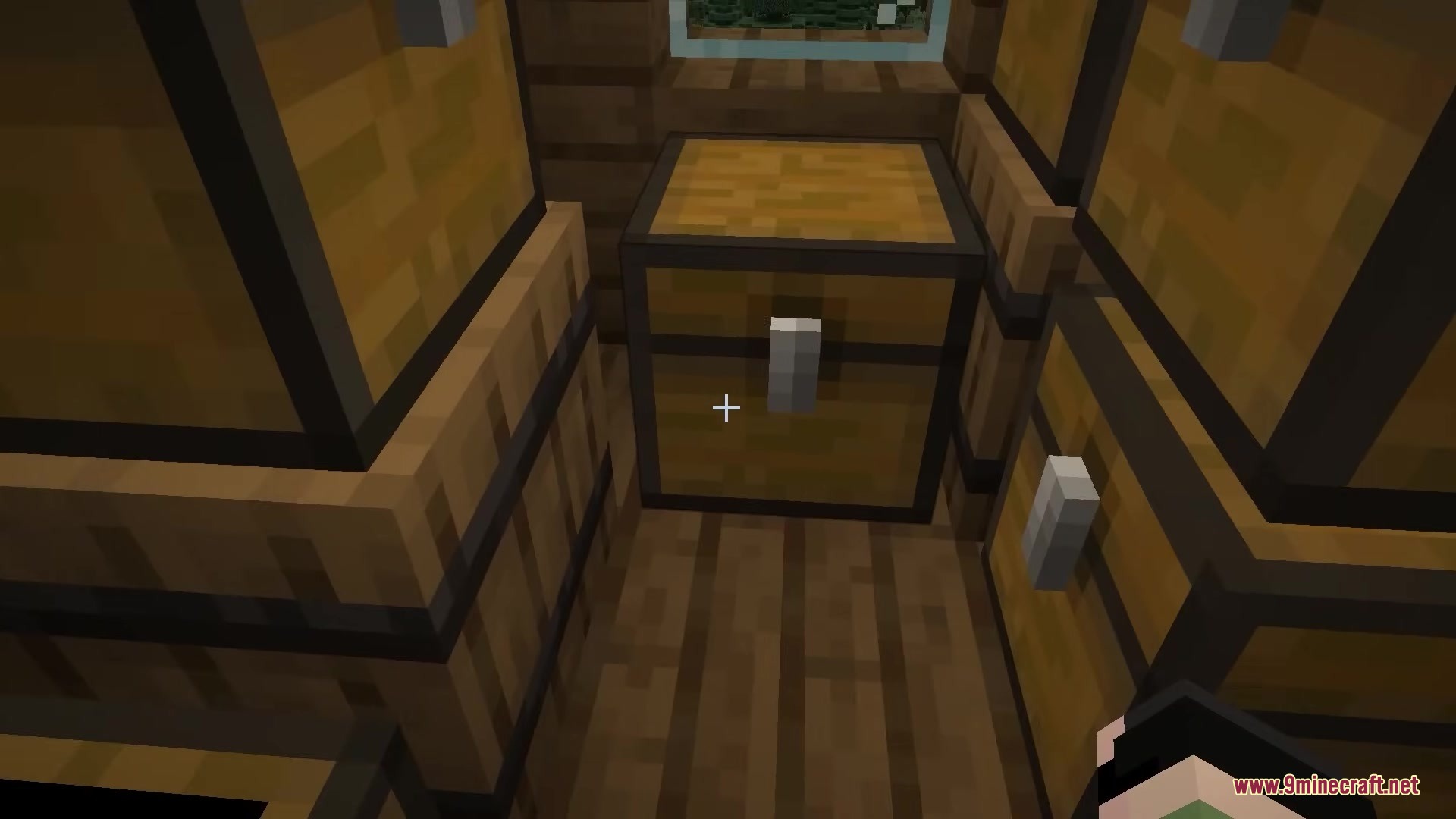 Buko's Enchantment Tips Resource Pack Screenshot 5 A player looks at a wooden chest inside a crowded storage room