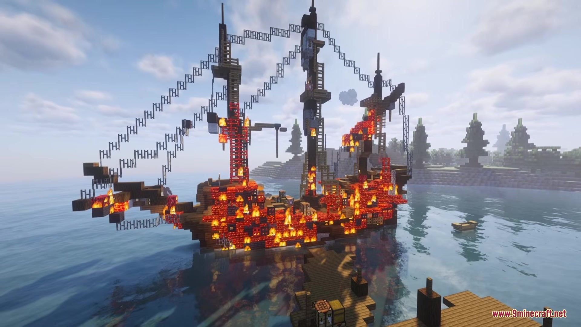 Burnt Fabric Mod Screenshot 1 A large wooden ship engulfed in flames on the water in Minecraft