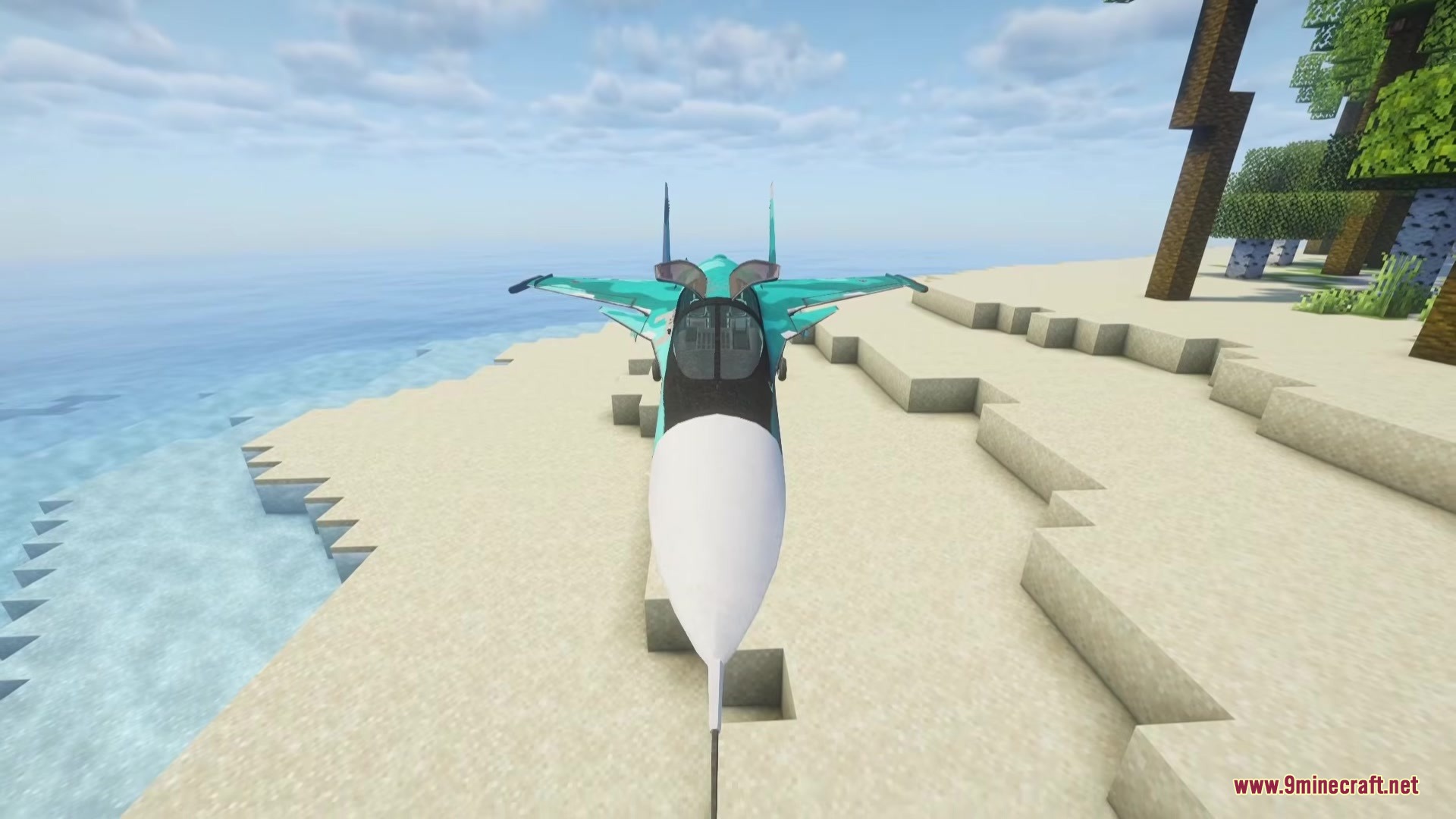 C.M.A Immersive Vehicles IV MTS Citizens Military Aviation Trasport Pack Mod Screenshot 3 A teal military fighter jet parked on a sandy Minecraft beach