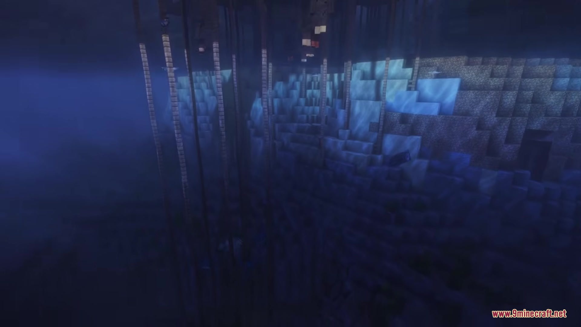 Cannibal Villages Mod Screenshot 1 Underwater view of wooden stilts supporting a tribal village in the ocean