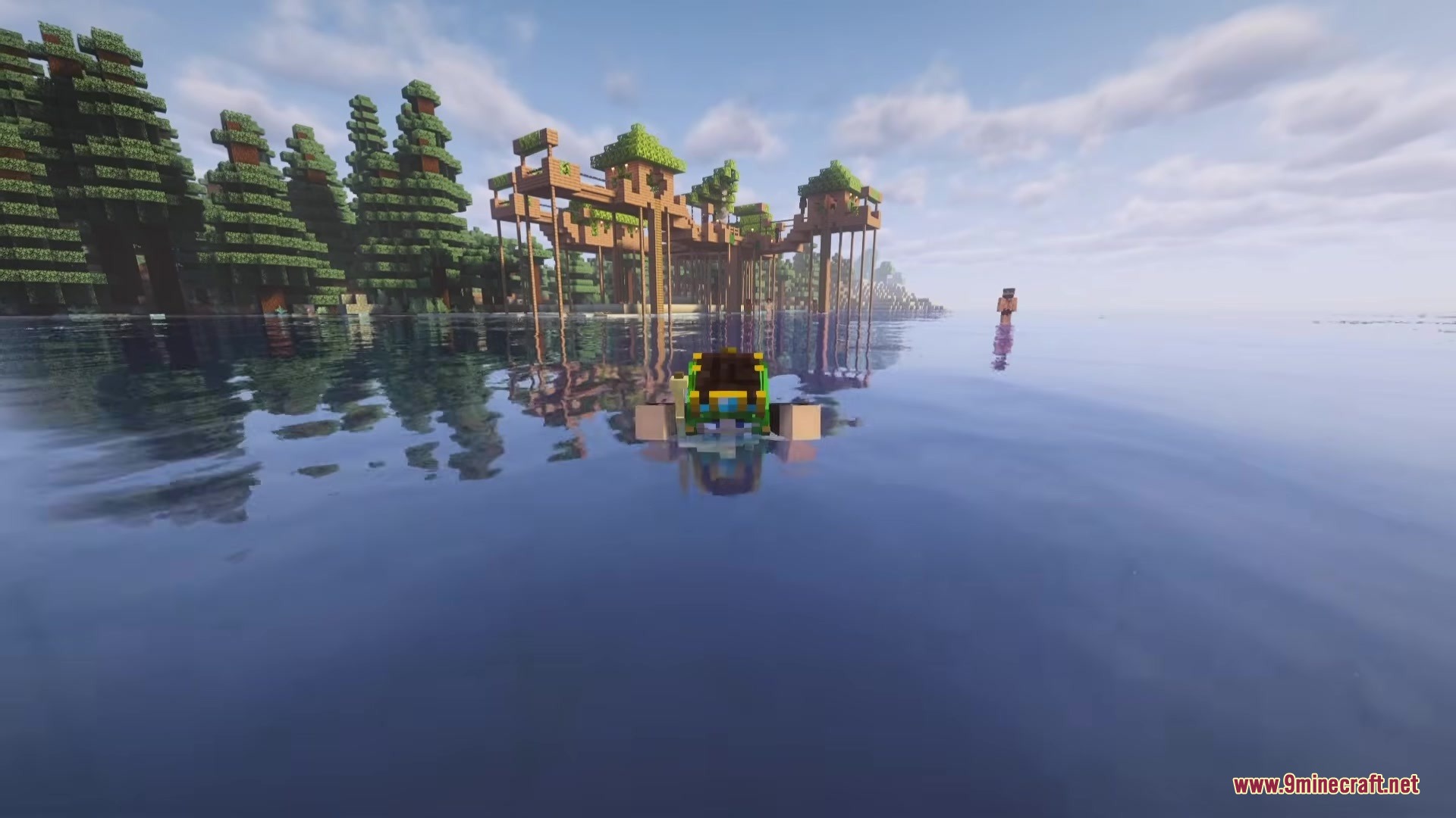 Cannibal Villages Mod Screenshot 7 Player swimming in the ocean toward a tribal village built on wooden stilts