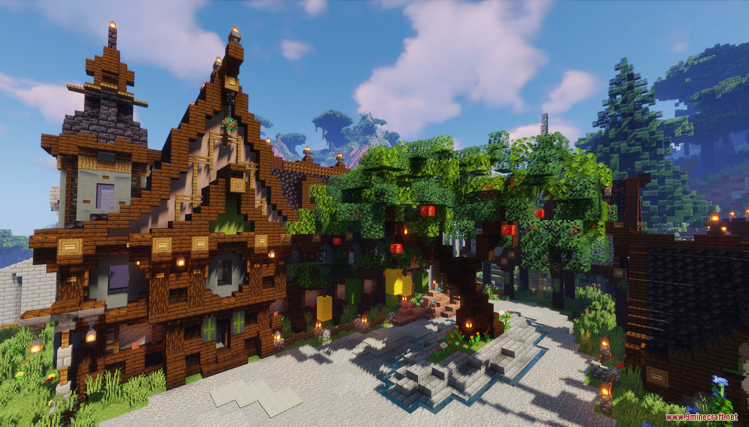 A detailed wooden house with a large tree and lanterns in Minecraft
