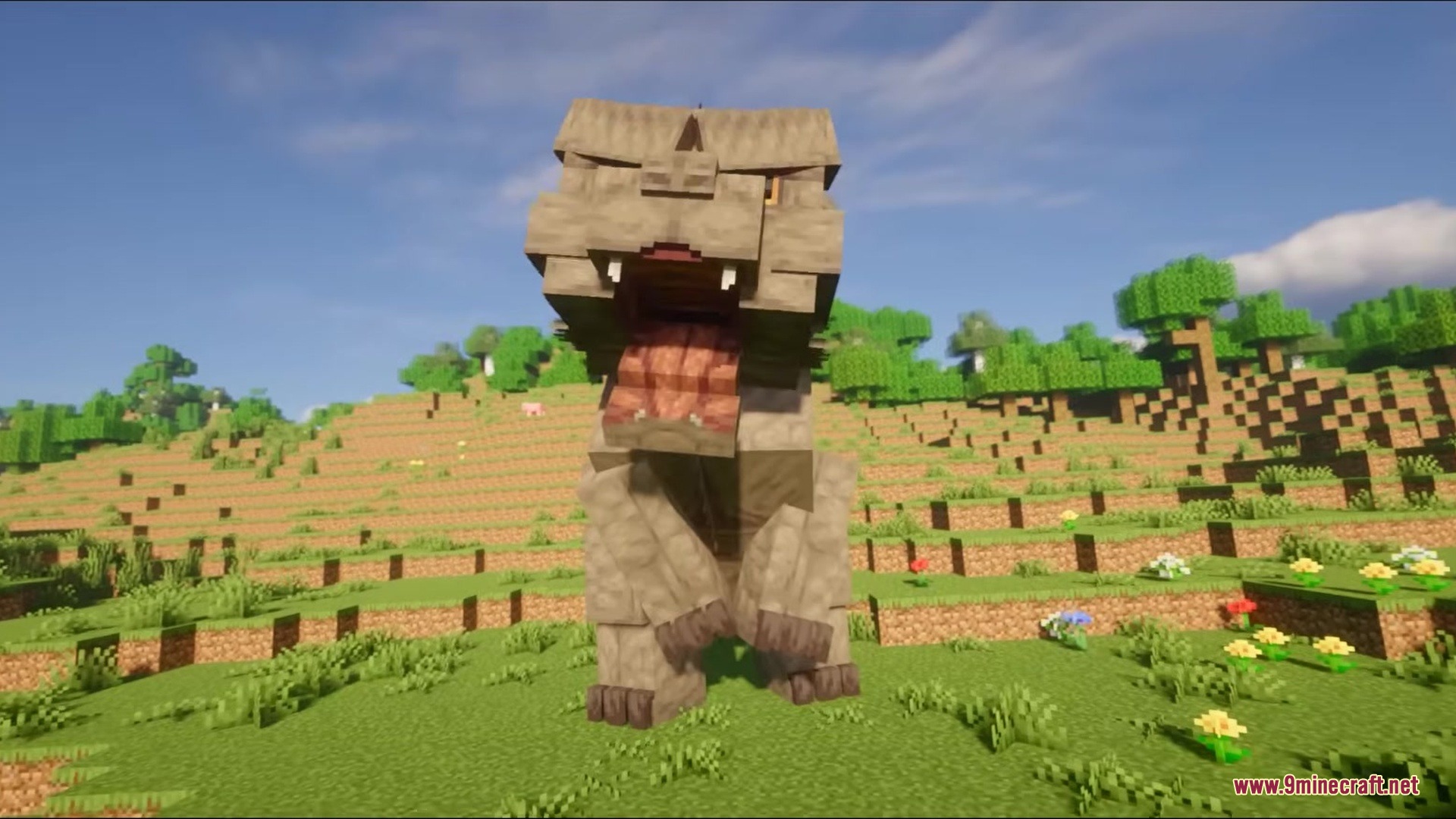 Catzilla Mod Screenshot 1 A giant Catzilla monster stands in a grassy field in Minecraft