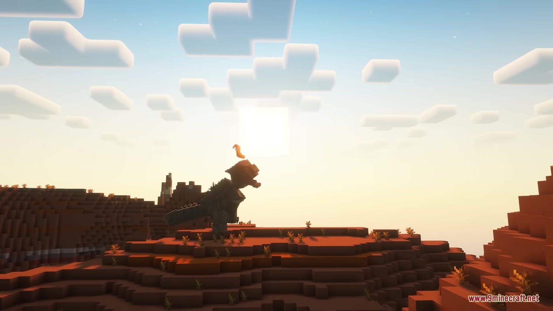 Catzilla Mod Screenshot 7 A giant cat monster stands atop a mesa hill during a bright sunset