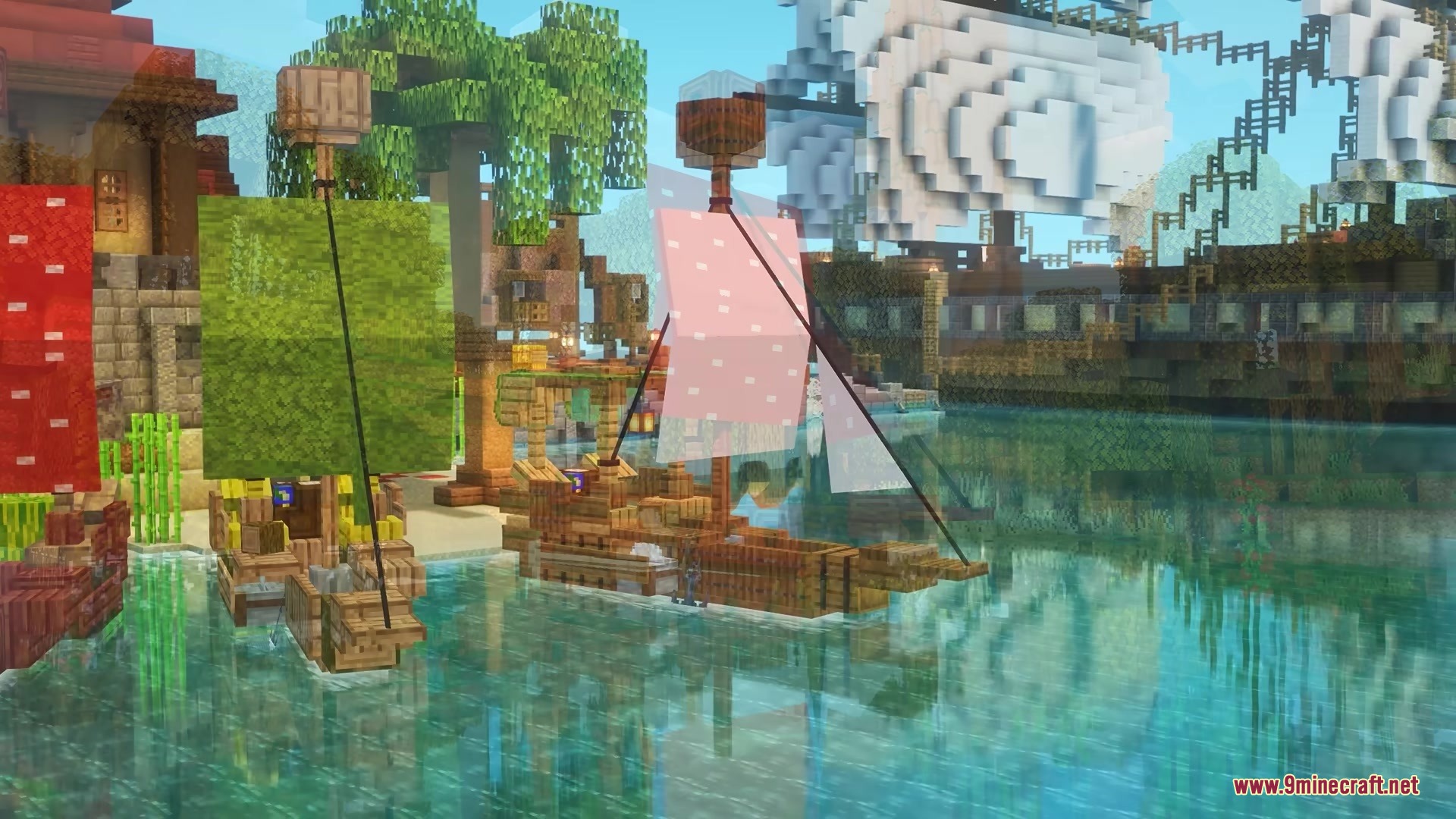 Several wooden sailing ships with colorful sails docked in a tropical harbor