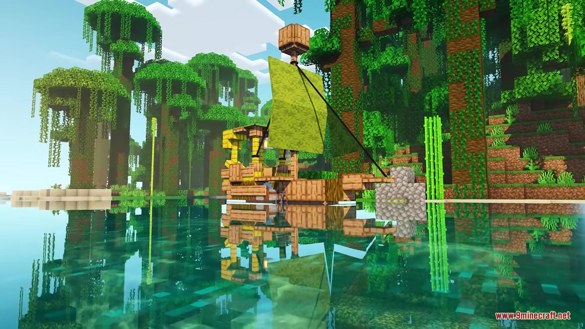 A wooden sailing ship with a green sail floating in a jungle river