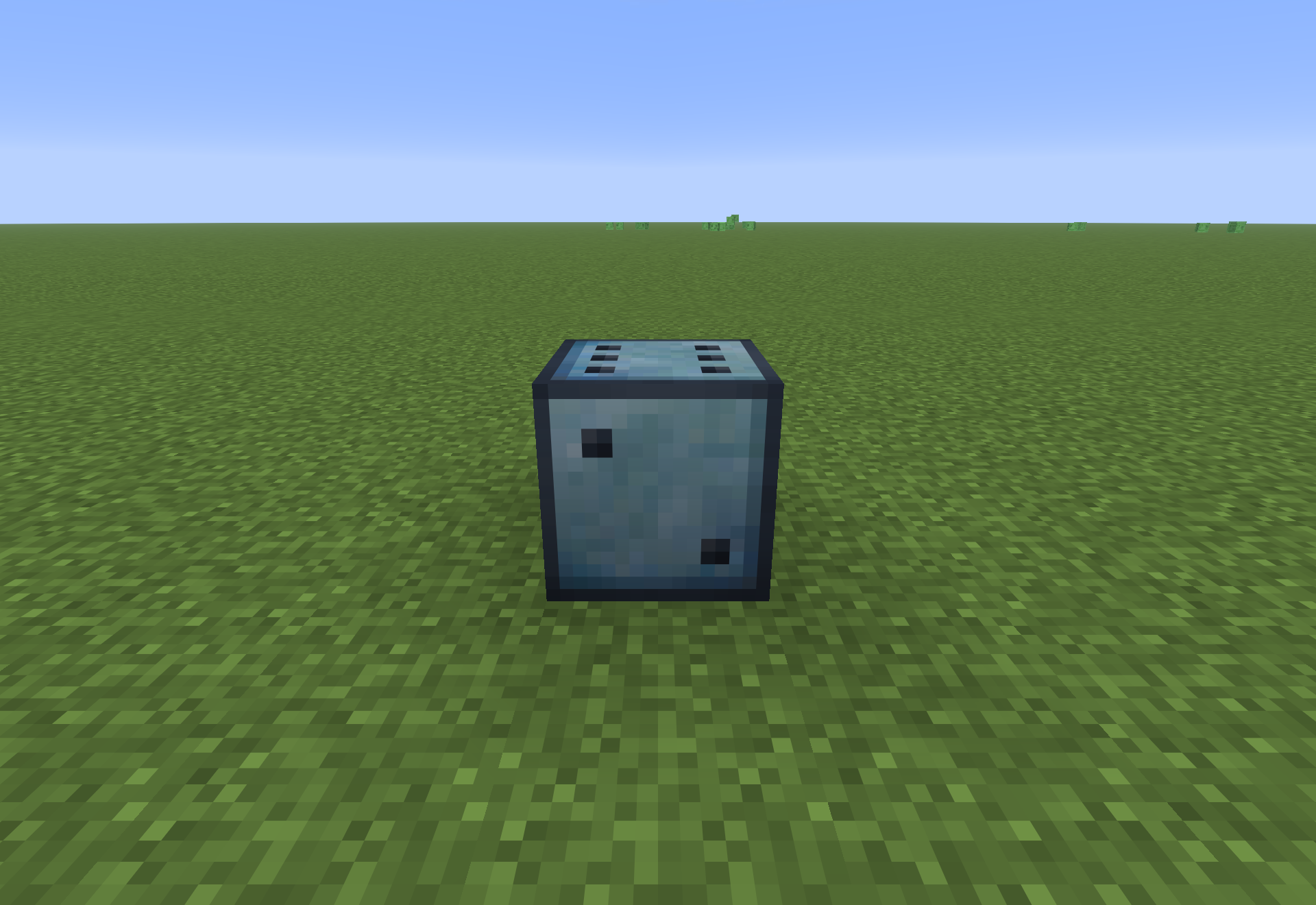 A Chance Cube placed in the world, showing its dice-style question-mark faces.