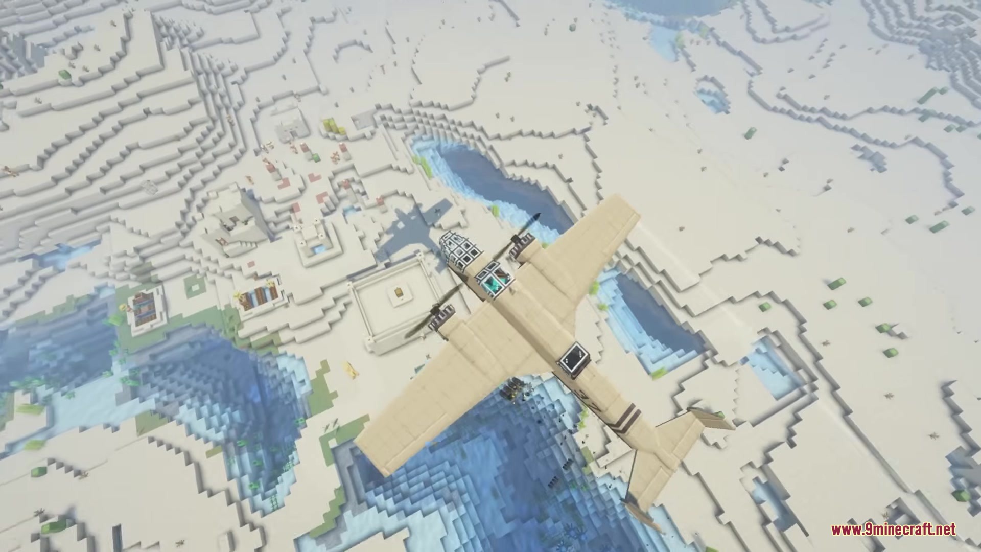 A tan twin engine plane flies over a desert village in Minecraft