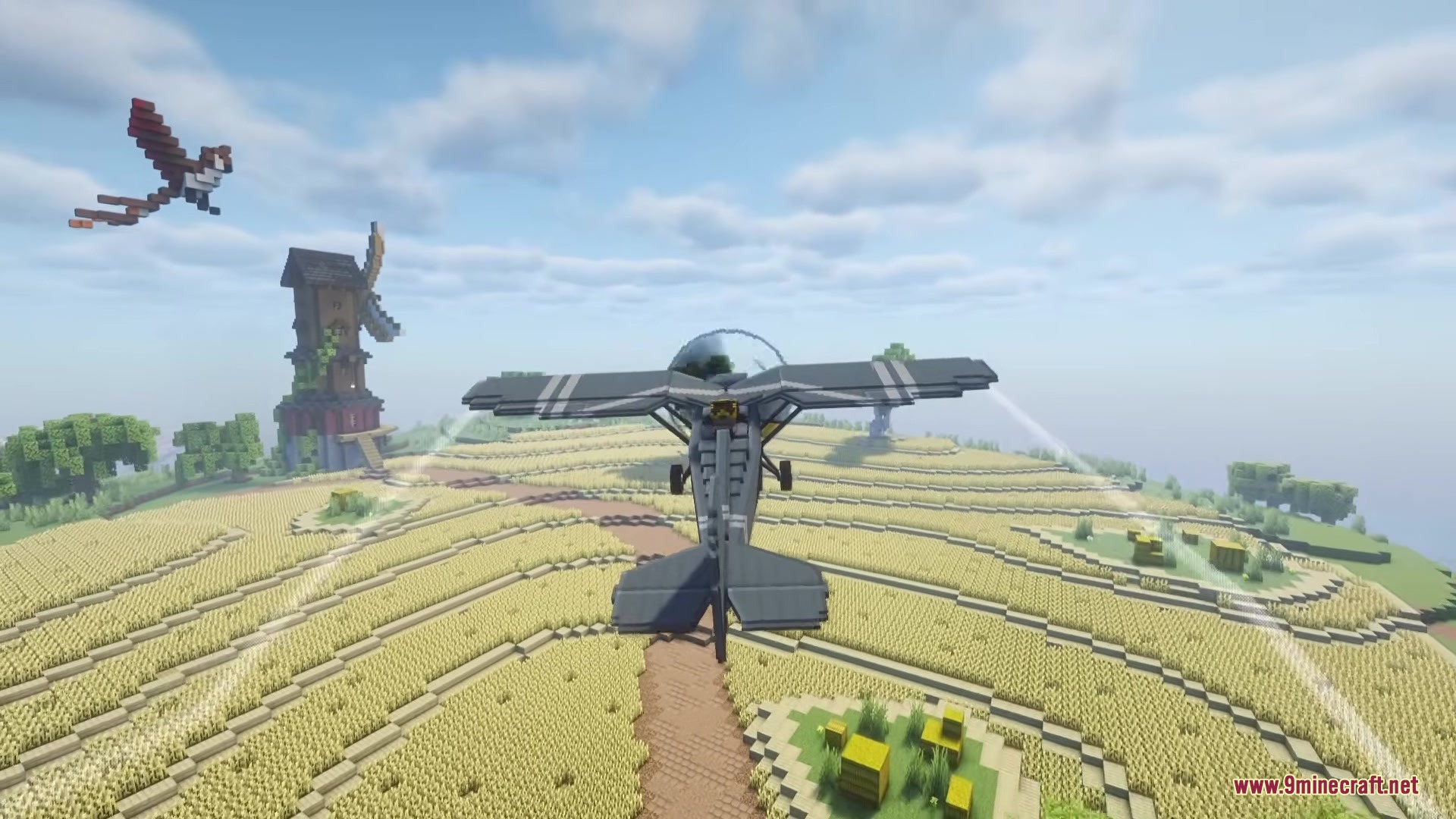 A modern aircraft flying over a large circular wheat farm in Minecraft