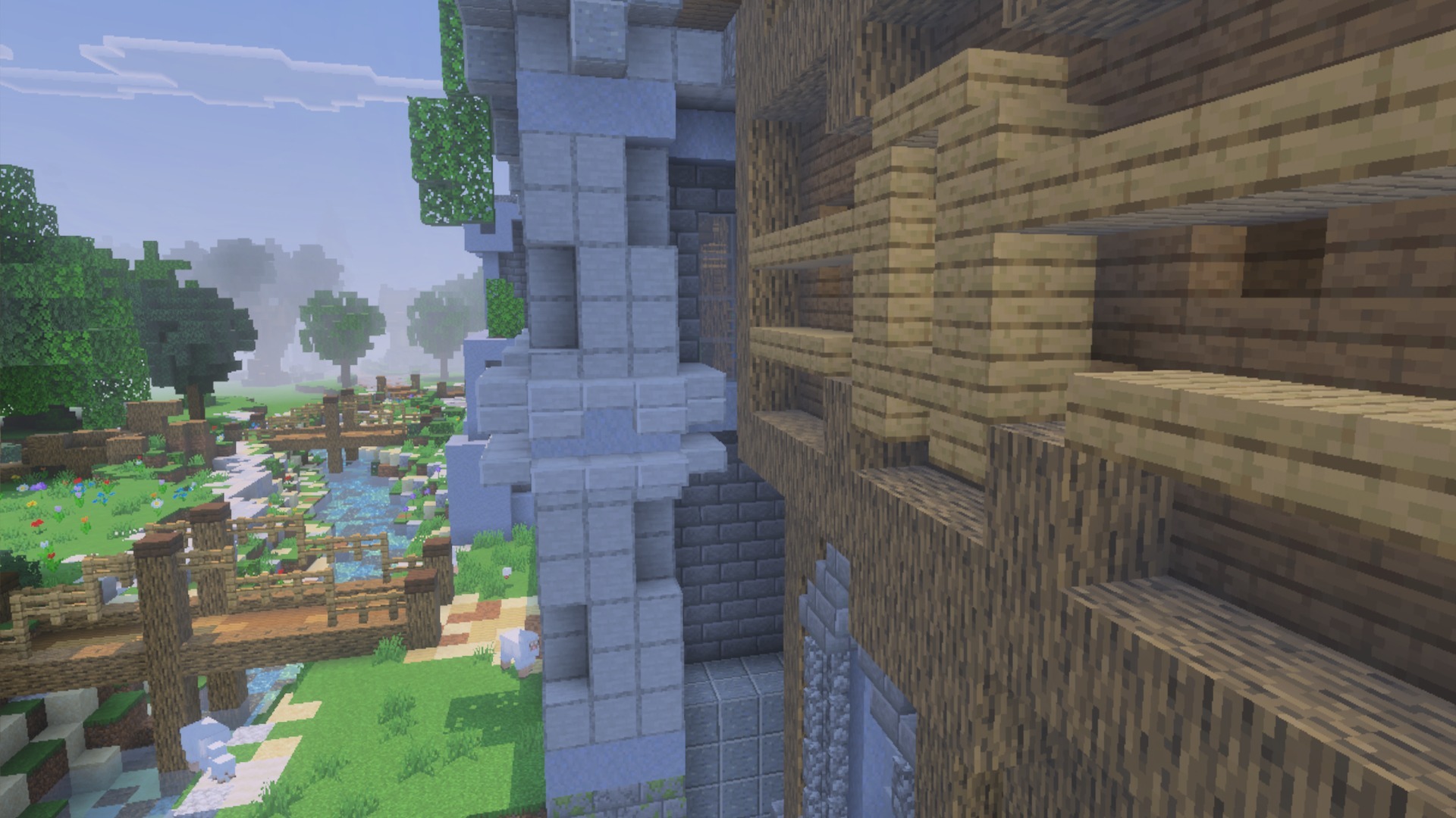 Close up view of stone and wooden buildings next to a river stream